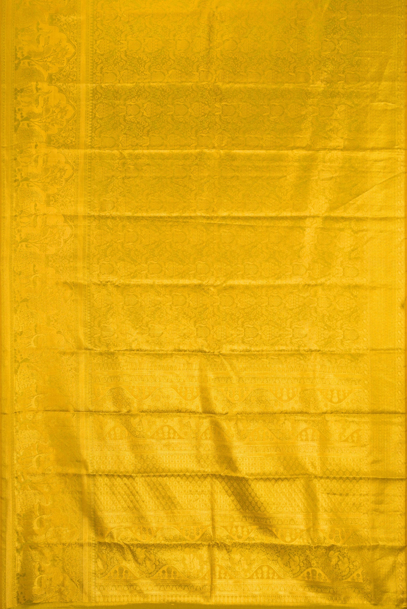 Flat view of Mehandi Green Dual Tone Kanjivaram Tissue Silk Saree with Zari Brocade on the body and Fancy Border. 