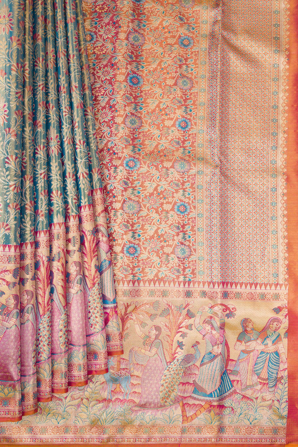Pleats and pallu of Blue Dual Tone Kanjivaram Tissue Silk Saree with Zari Brocade on the body and Fancy Border. 