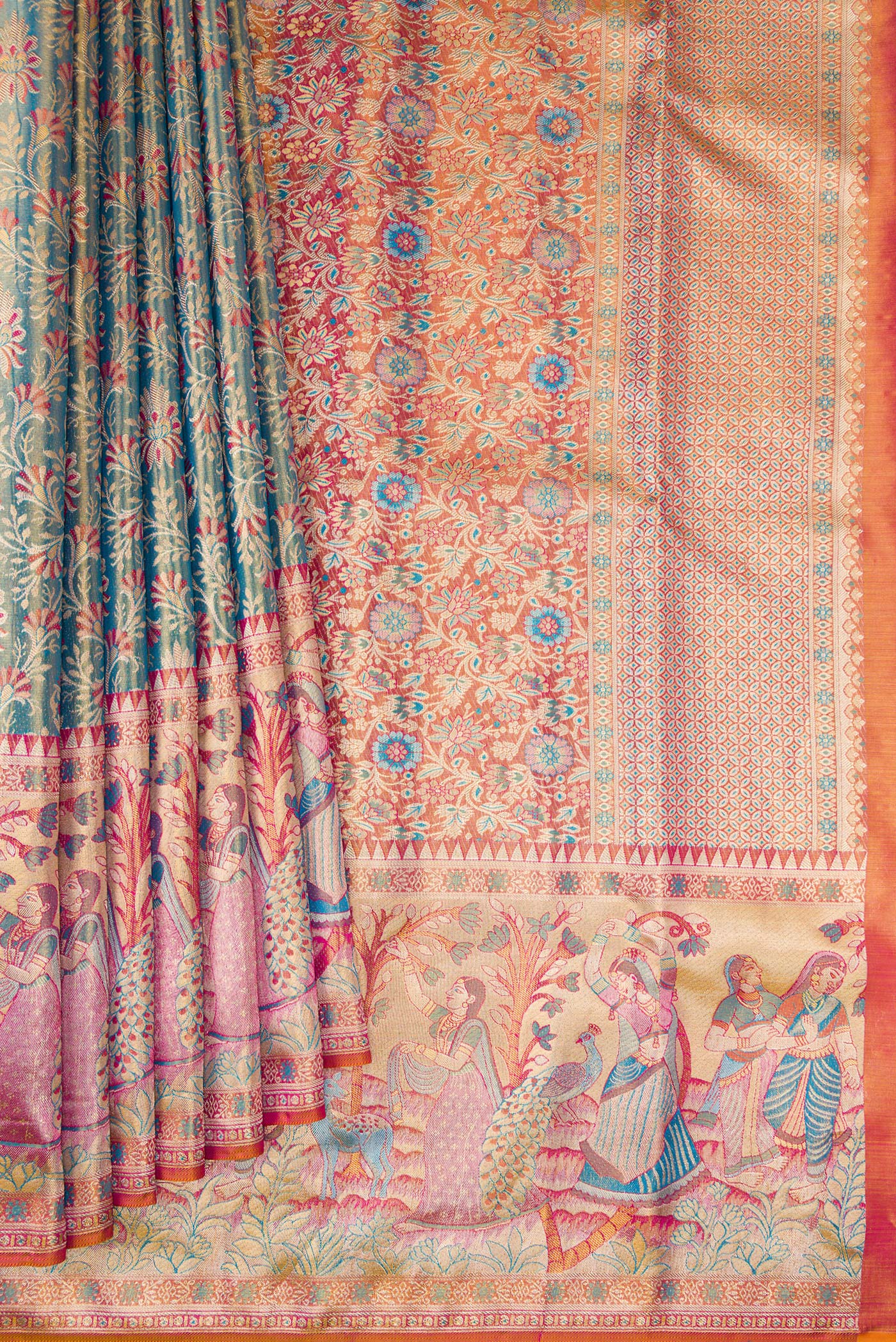 Pleats and pallu of Blue Dual Tone Kanjivaram Tissue Silk Saree with Zari Brocade on the body and Fancy Border. 
