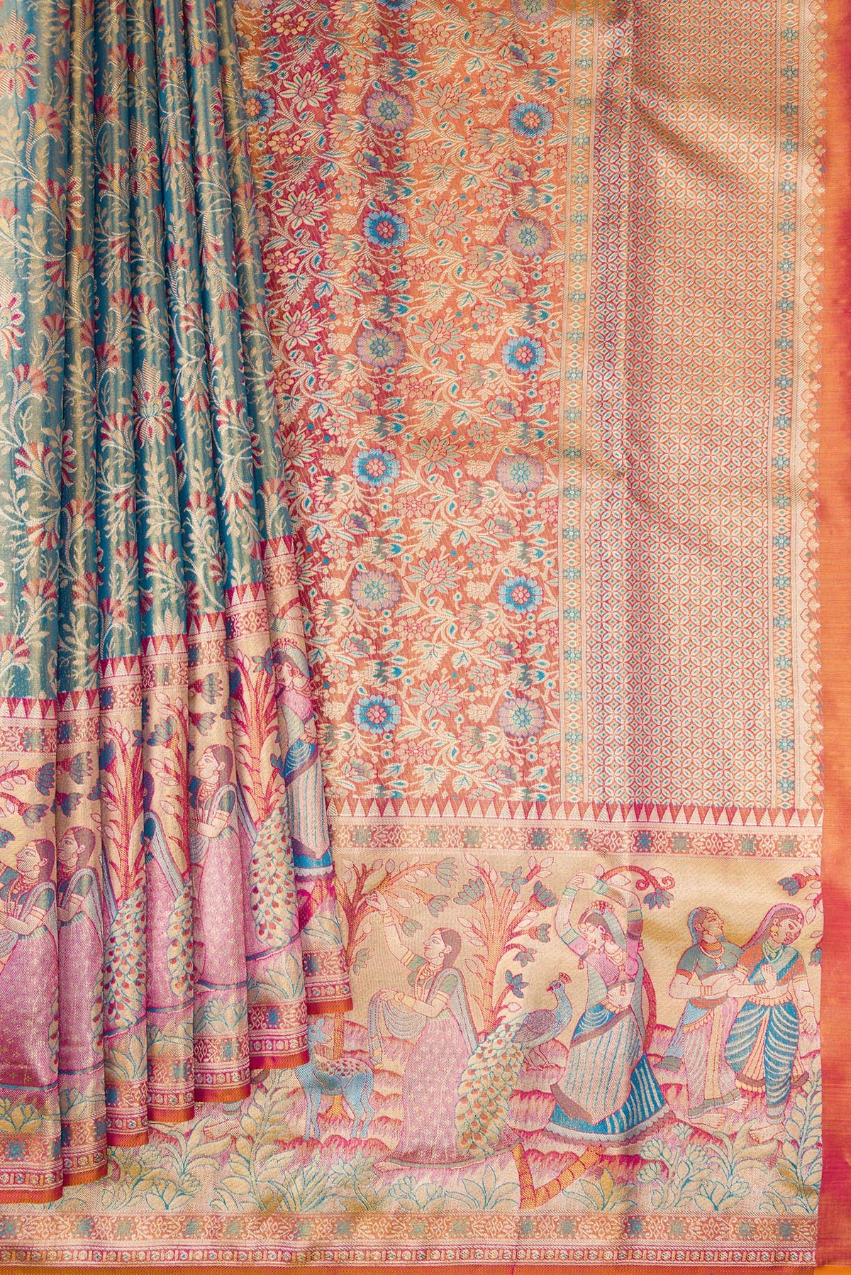 Pleats and pallu of Blue Dual Tone Kanjivaram Tissue Silk Saree with Zari Brocade on the body and Fancy Border. 