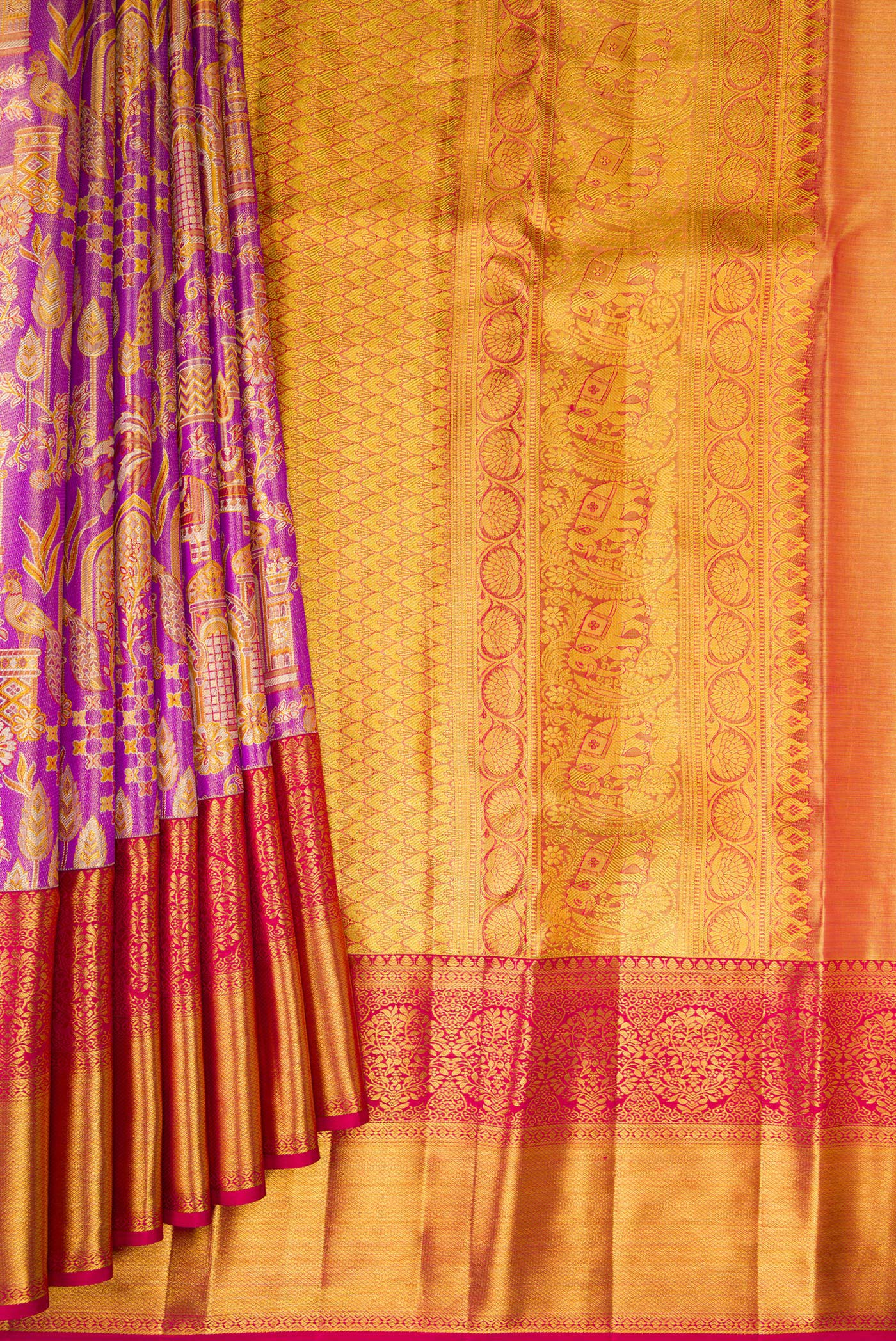 Pleats and pallu of Purple Dual Tone Kanjivaram Tissue Silk Saree with Zari Brocade on the body and Zari Border. 