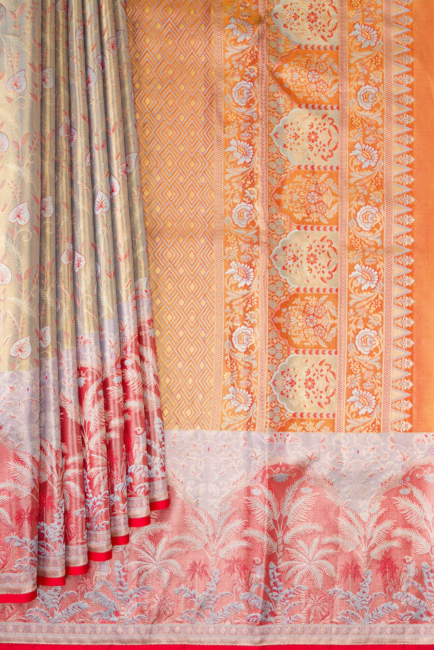 Pleats and pallu of Light Green Dual Tone Kanjivaram Tissue Silk Saree with Zari Brocade on the body and Fancy Border. 