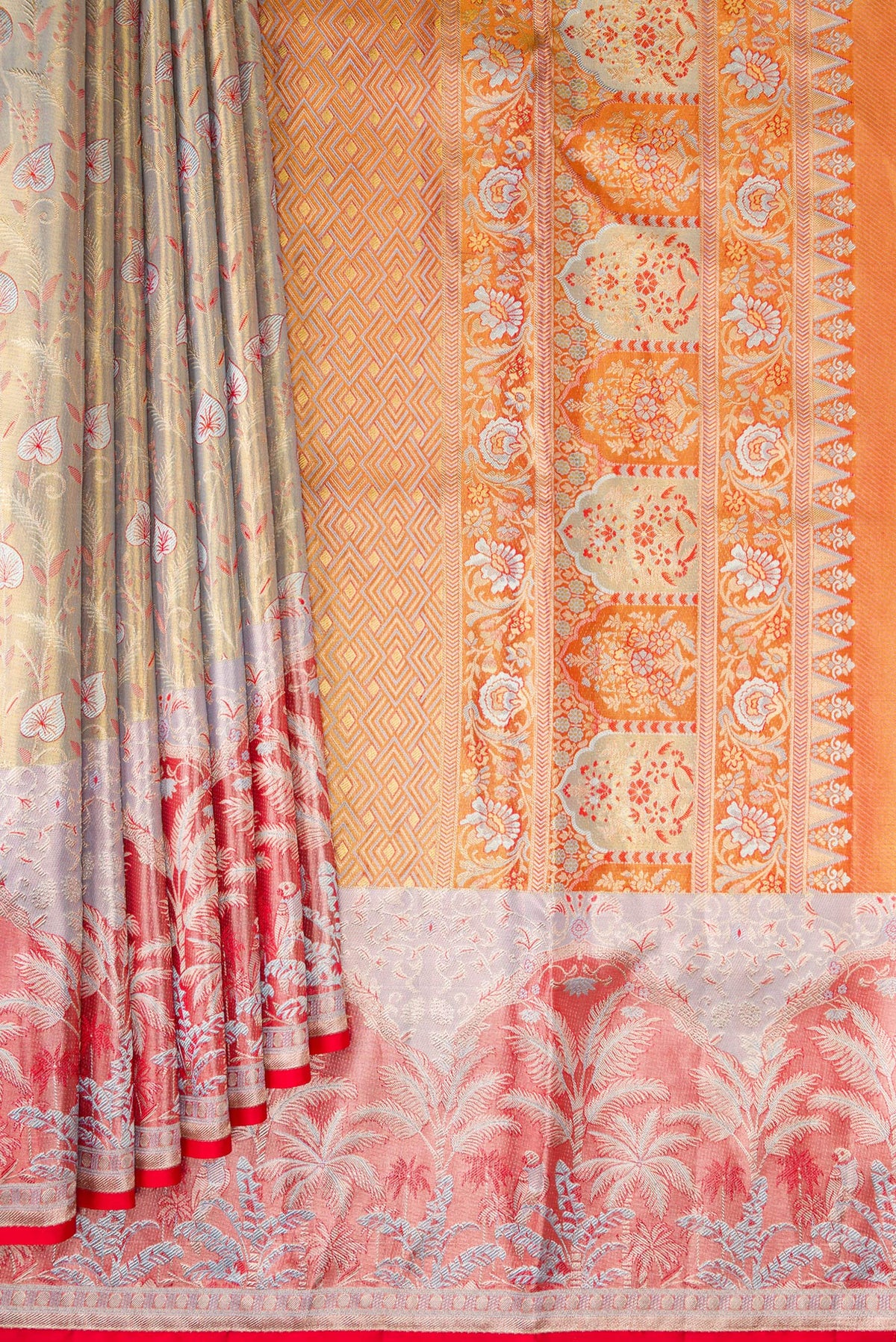 Pleats and pallu of Light Green Dual Tone Kanjivaram Tissue Silk Saree with Zari Brocade on the body and Fancy Border. 