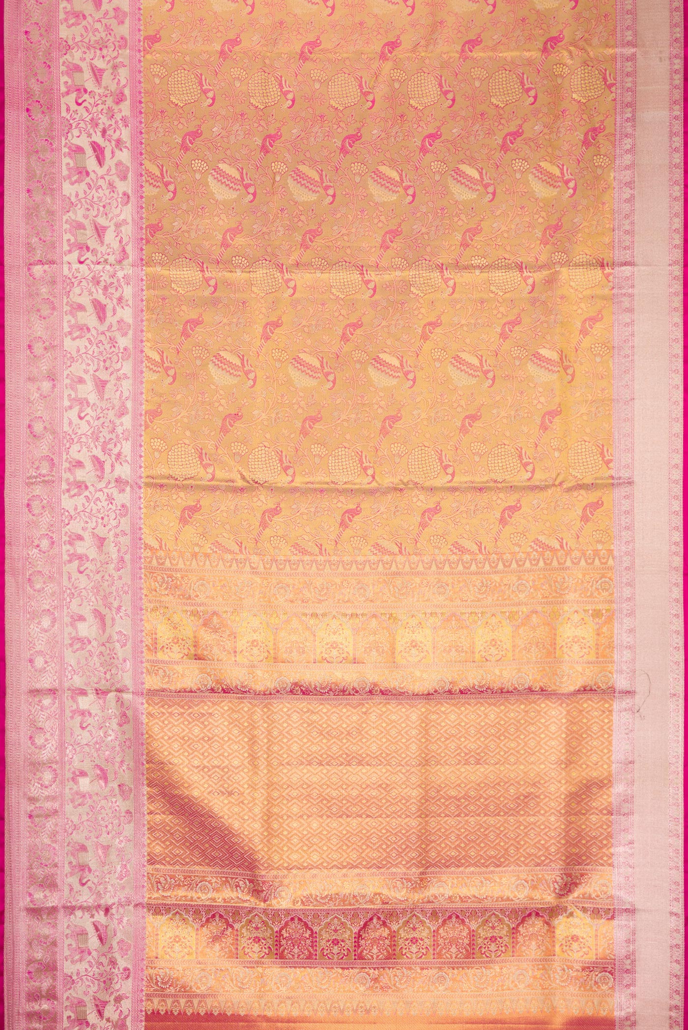 Flat view of Pink Dual Tone Kanjivaram Tissue Silk Saree with Zari Brocade on the body and Zari Border. 