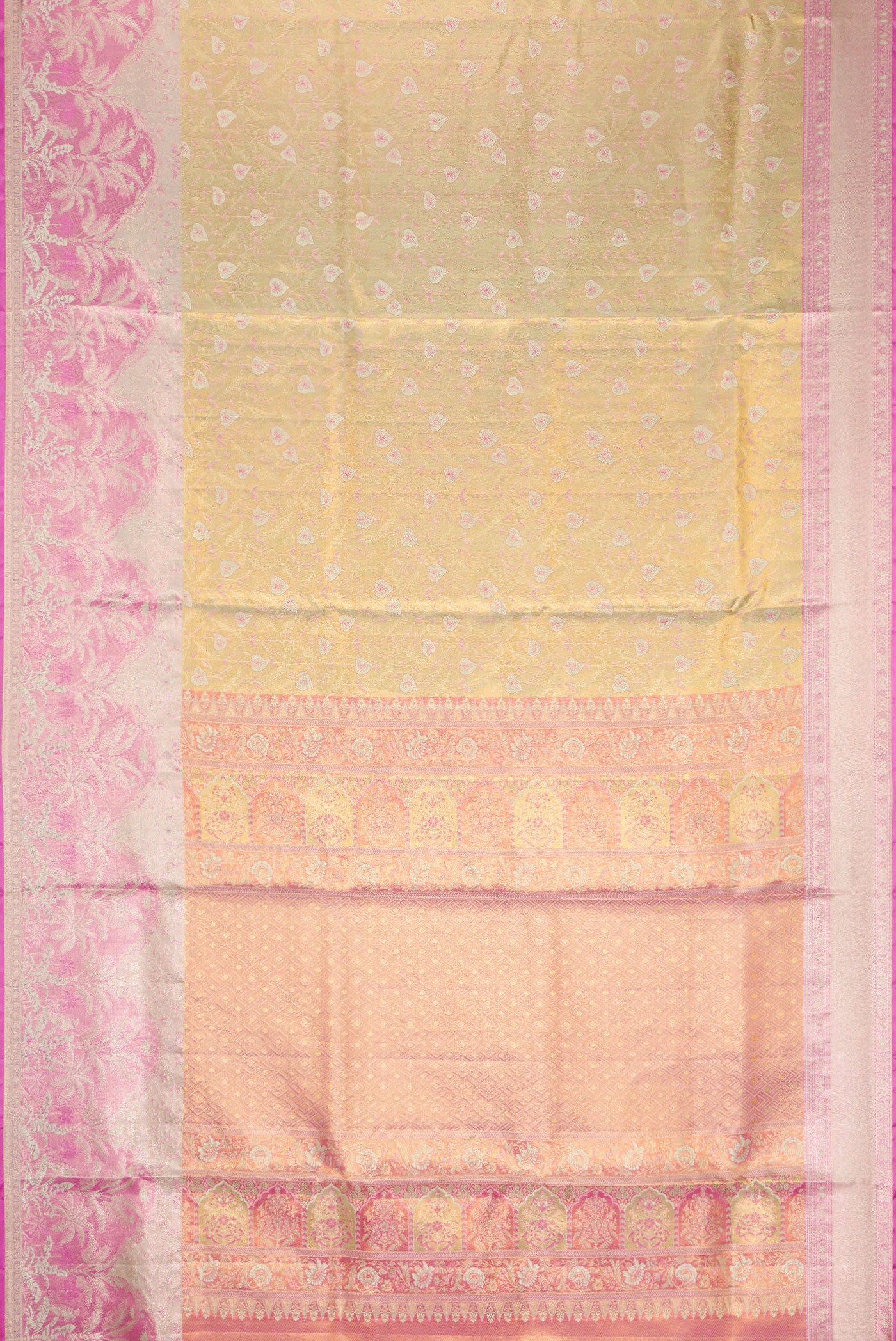 Flat view of Gold Dual Tone Kanjivaram Tissue Silk Saree with Zari Brocade on the body and Fancy Border. 