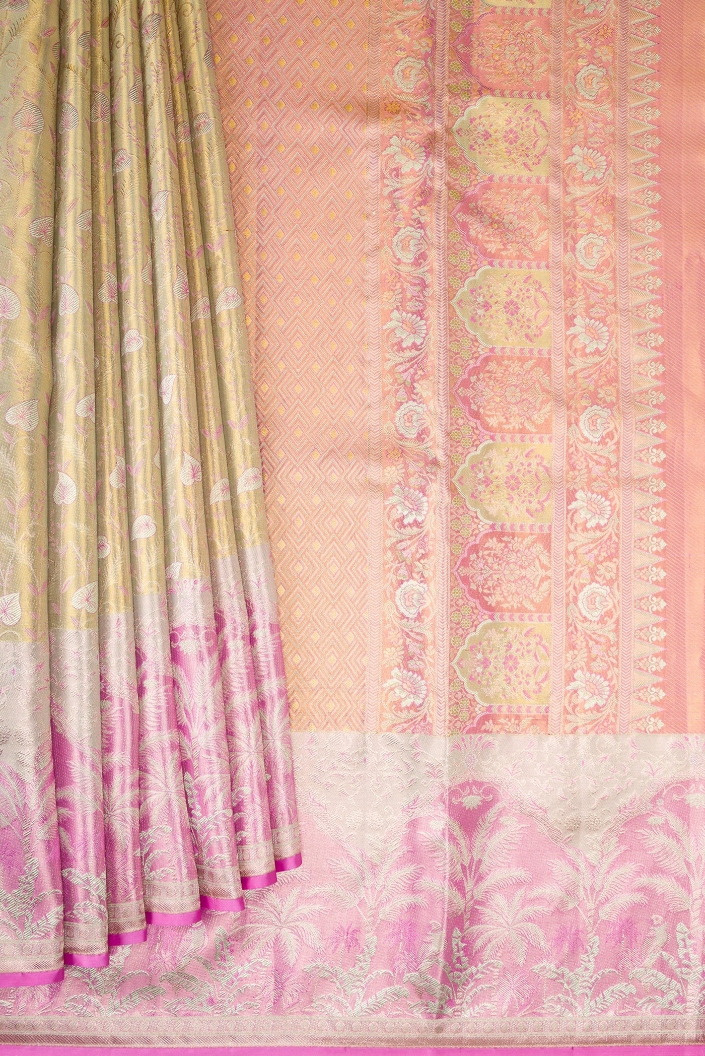 Pleats and pallu of Gold Dual Tone Kanjivaram Tissue Silk Saree with Zari Brocade on the body and Fancy Border. 