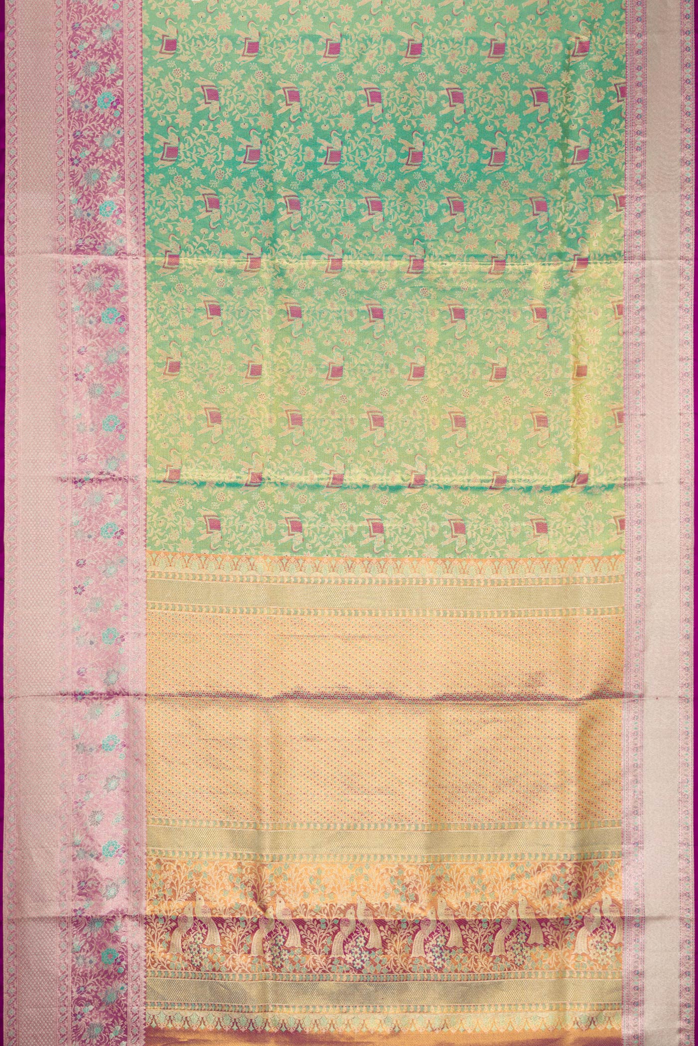 Flat view of Sea Green Dual Tone Kanjivaram Tissue Silk Saree with Zari Brocade on the body and Zari Border. 