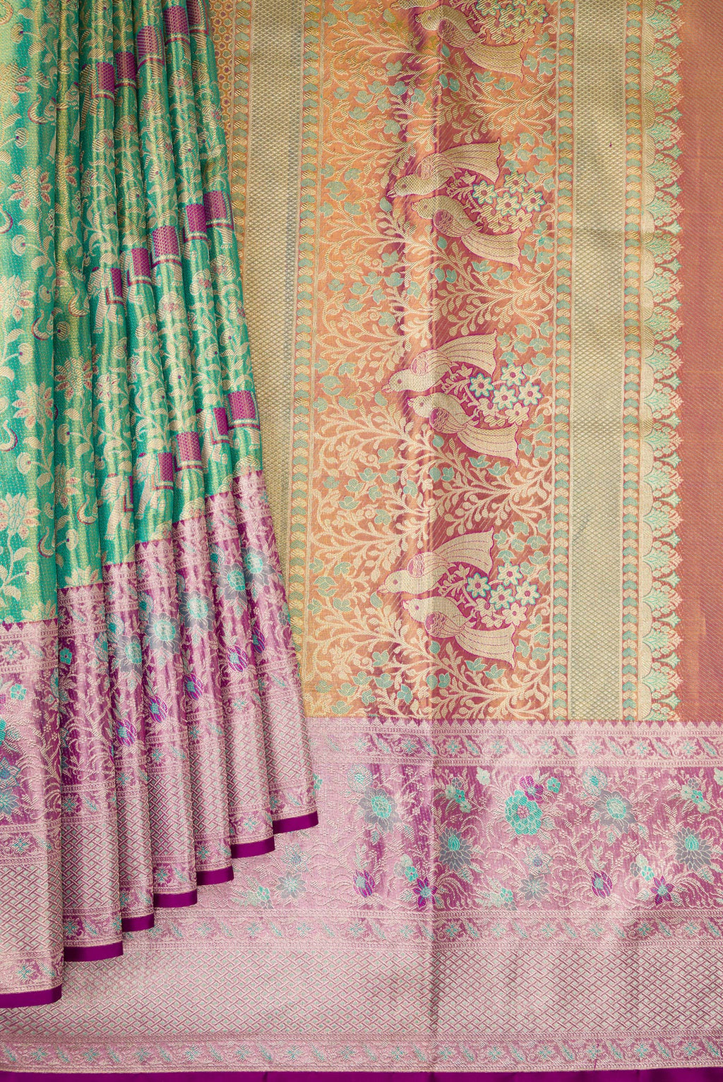 Pleats and pallu of Sea Green Dual Tone Kanjivaram Tissue Silk Saree with Zari Brocade on the body and Zari Border. 