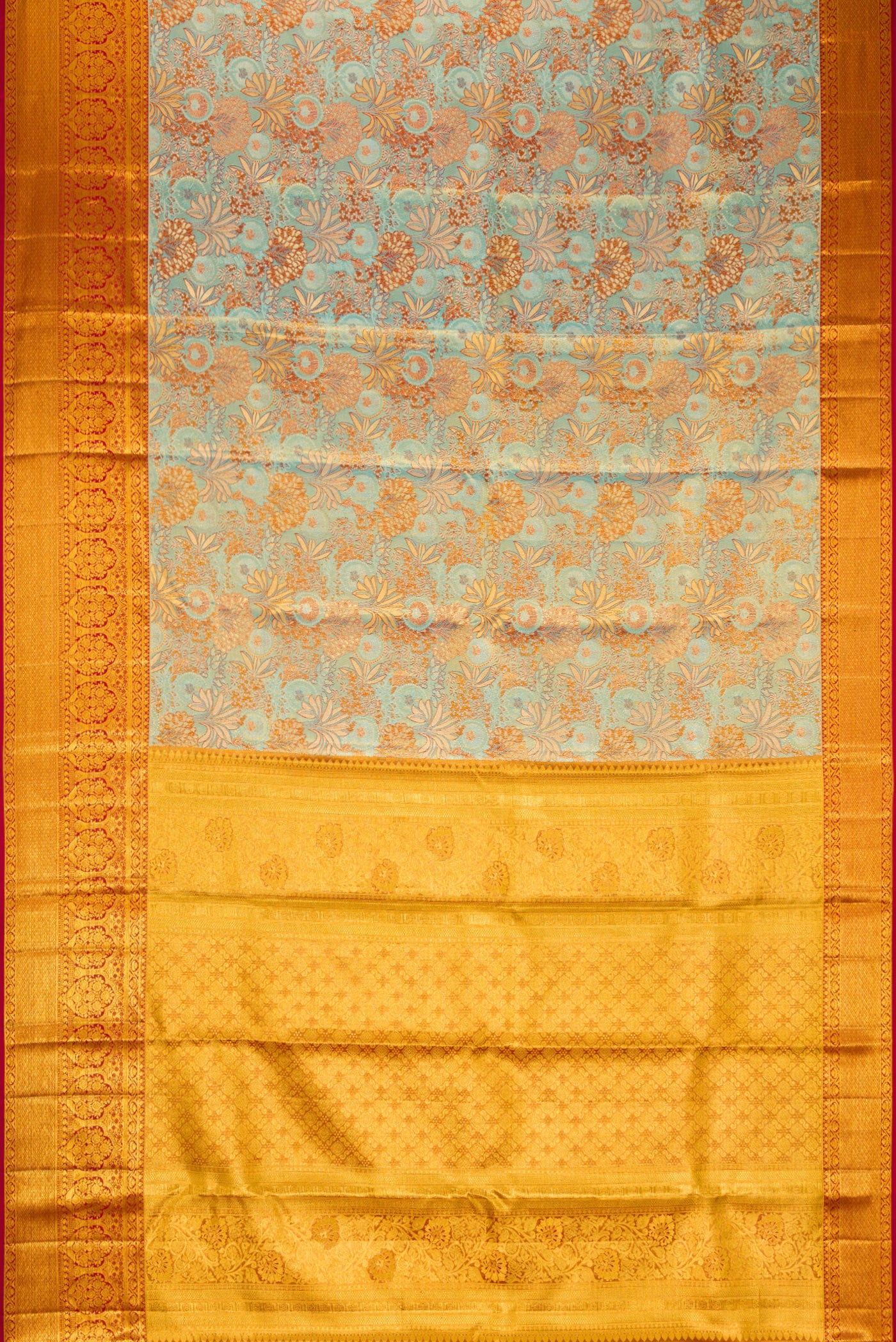 Flat view of Blue Dual Tone Kanjivaram Tissue Silk Saree with Zari Brocade on the body and Zari Border. 