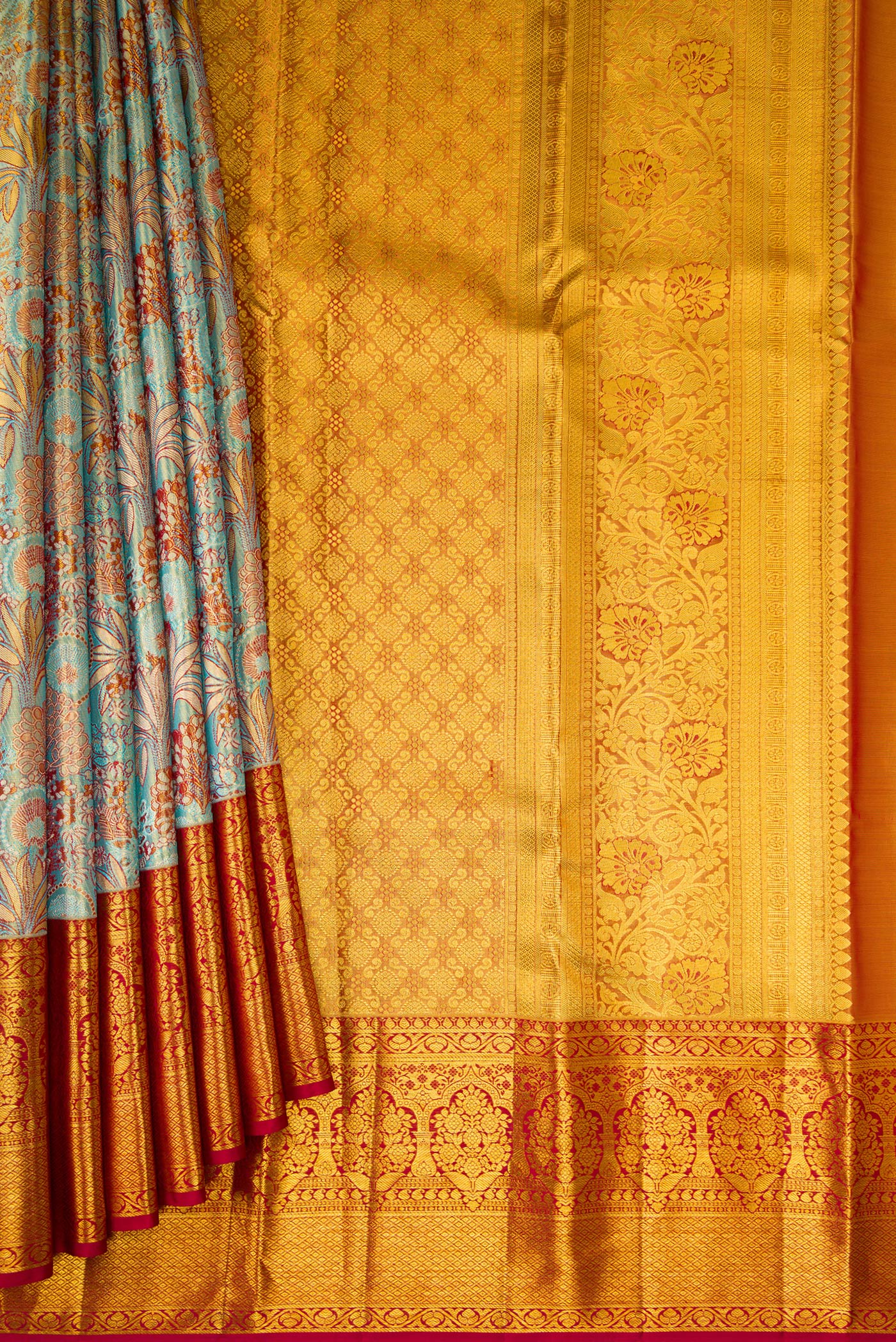 Pleats and pallu of Blue Dual Tone Kanjivaram Tissue Silk Saree with Zari Brocade on the body and Zari Border. 