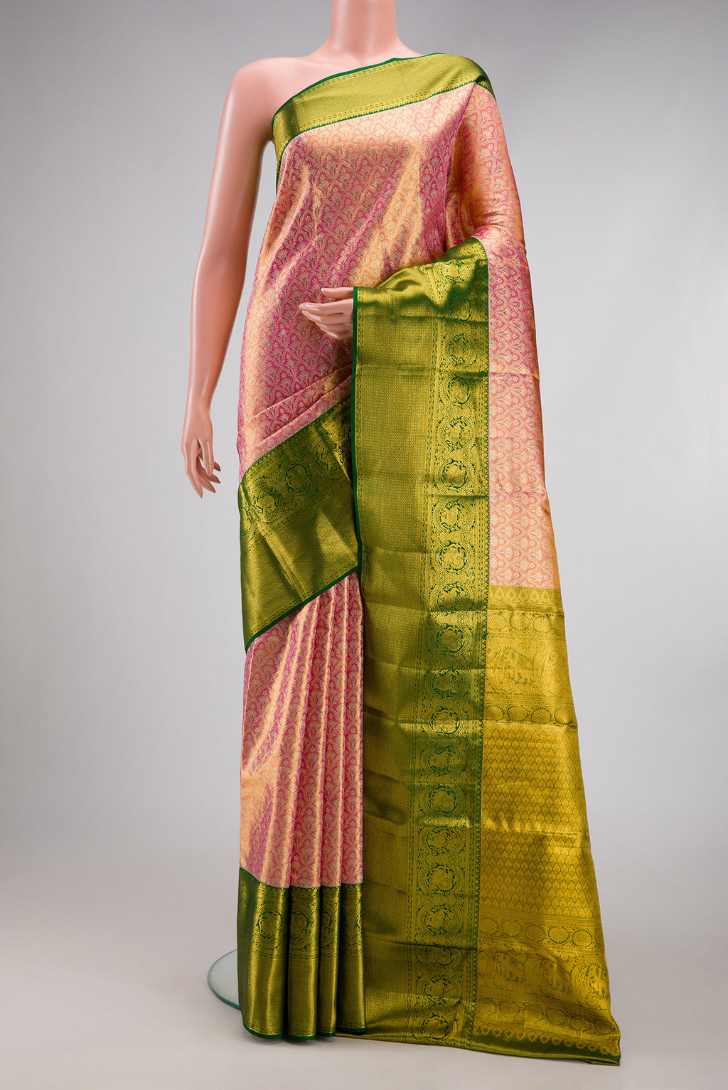 Pink Dual Tone Kanjivaram Tissue Silk Saree with Zari Brocade on the body and Zari Border.  displayed on a mannequin