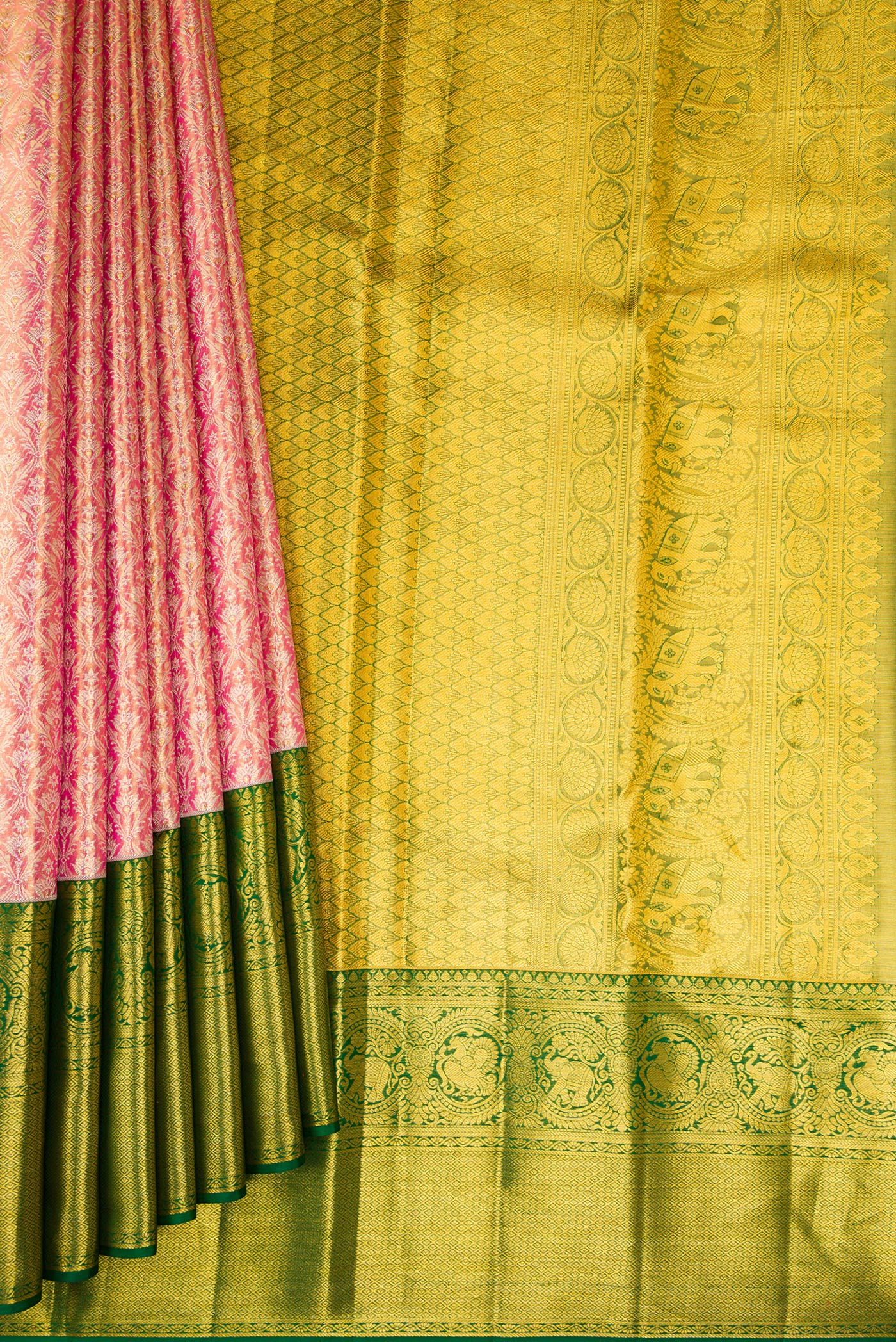 Pleats and pallu of Pink Dual Tone Kanjivaram Tissue Silk Saree with Zari Brocade on the body and Zari Border. 