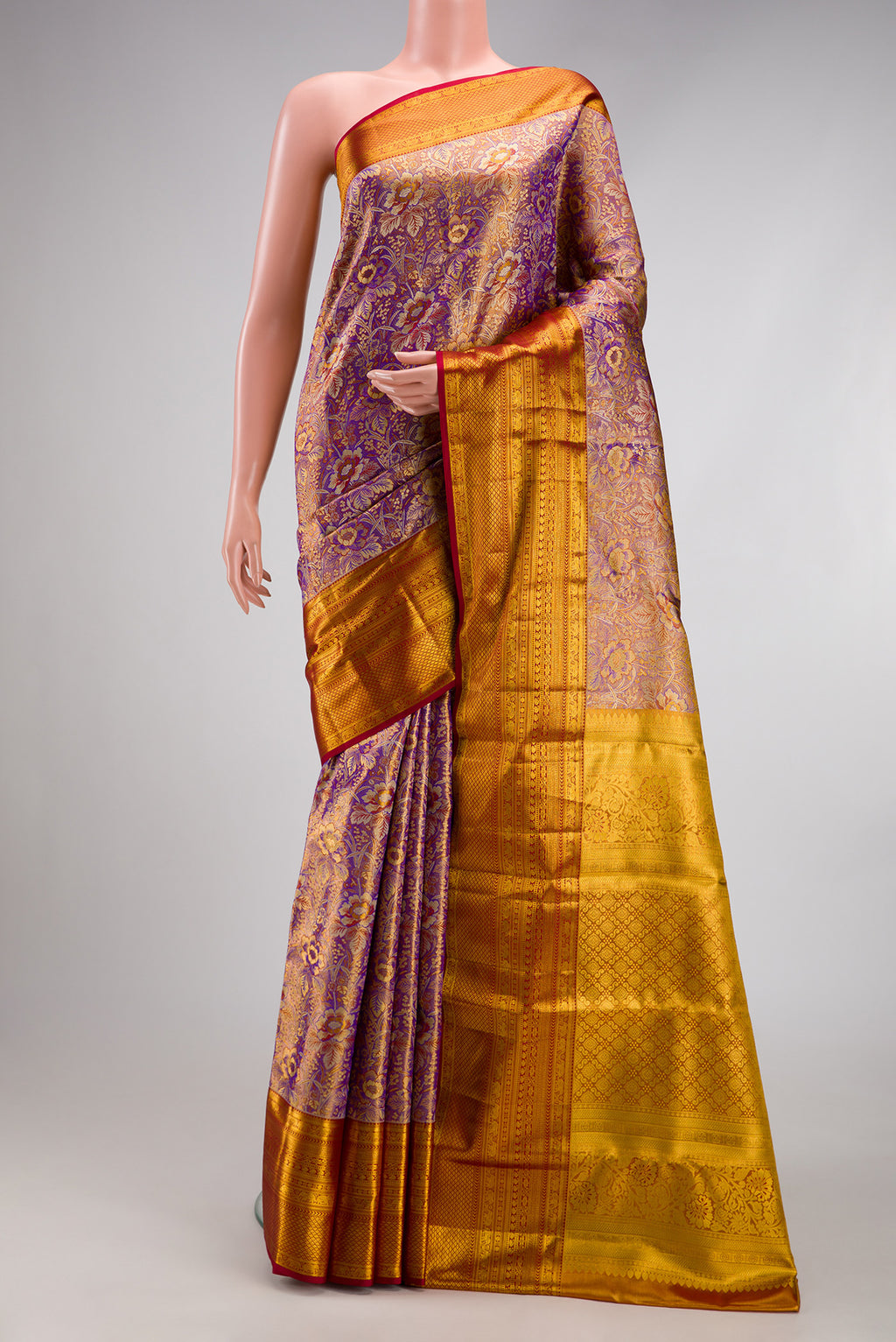 Purple Dual Tone Kanjivaram Tissue Silk Saree with Zari Brocade on the body and Zari Border.  displayed on a mannequin