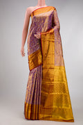 Purple Dual Tone Kanjivaram Tissue Silk Saree with Zari Brocade on the body and Zari Border.  displayed on a mannequin