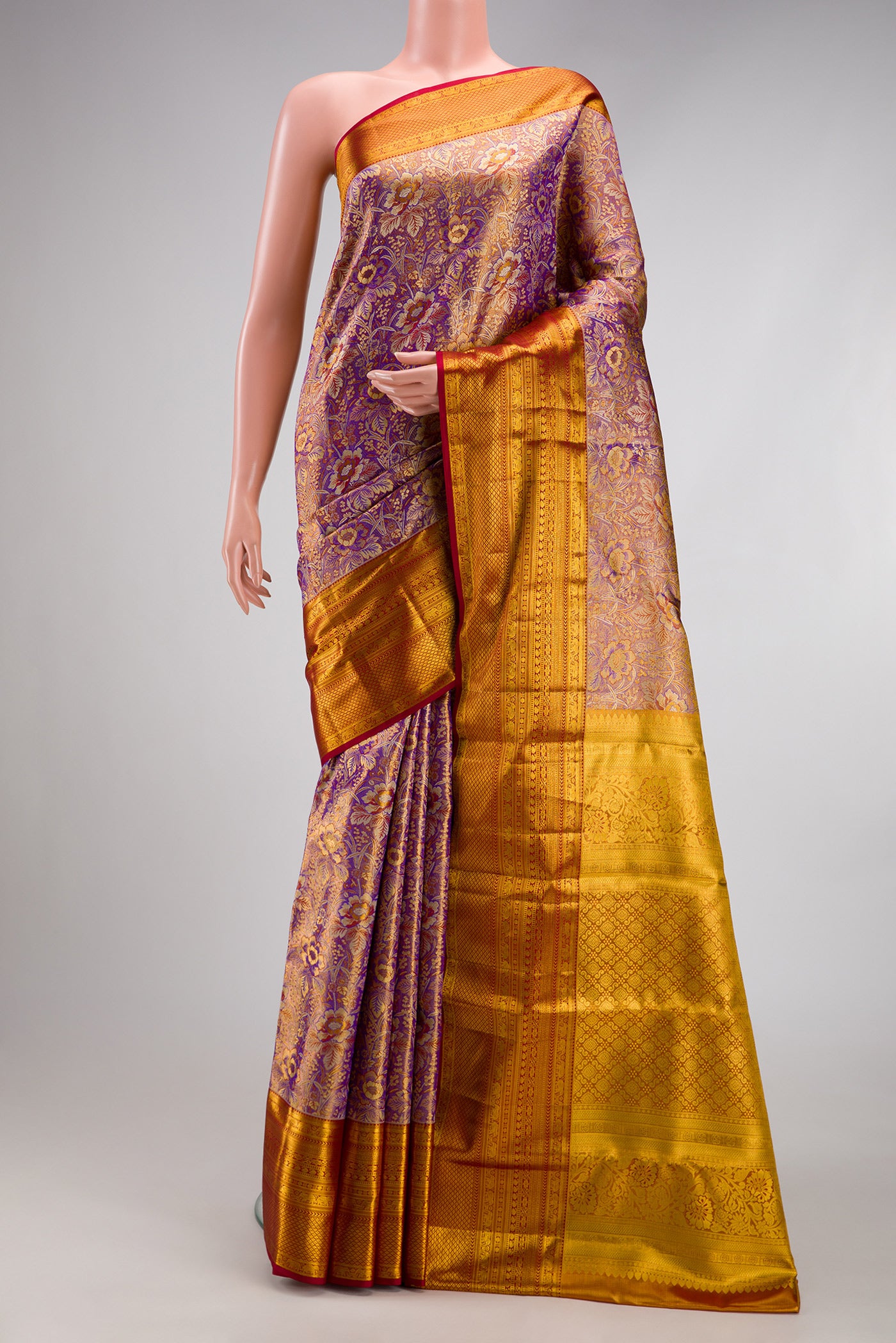 Purple Dual Tone Kanjivaram Tissue Silk Saree with Zari Brocade on the body and Zari Border.  displayed on a mannequin