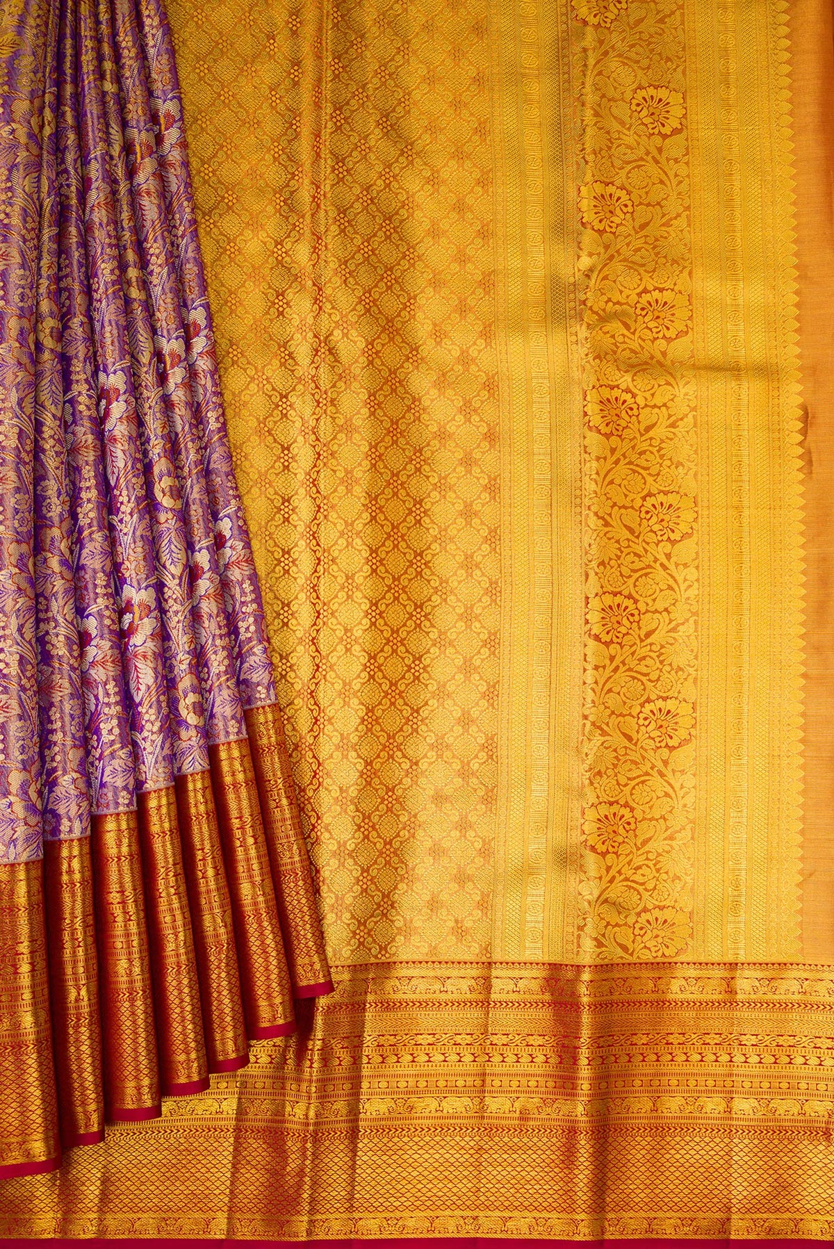 Pleats and pallu of Purple Dual Tone Kanjivaram Tissue Silk Saree with Zari Brocade on the body and Zari Border. 