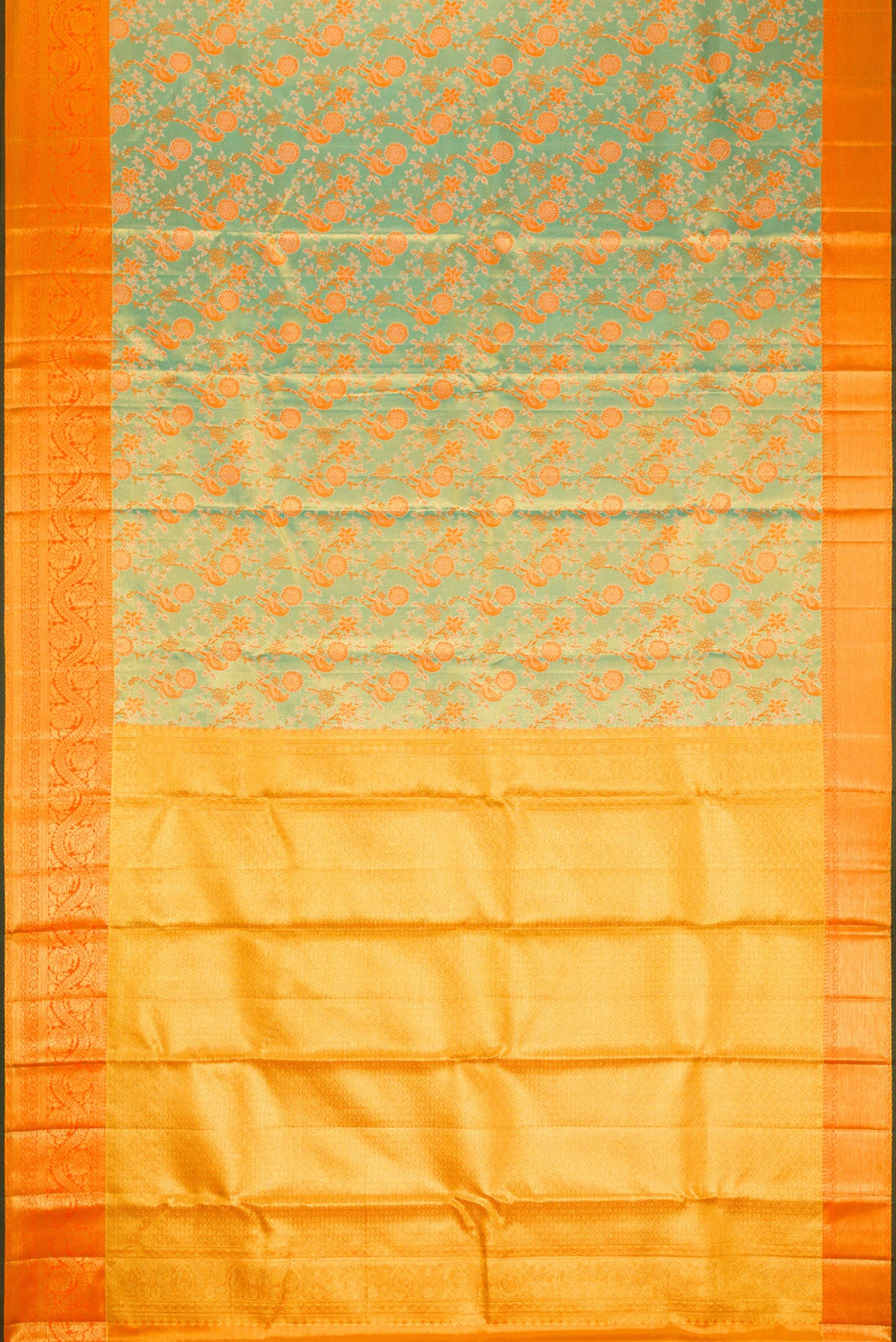 Flat view of Sea Green Dual Tone Kanjivaram Tissue Silk Saree with Zari Brocade on the body and Zari Border. 