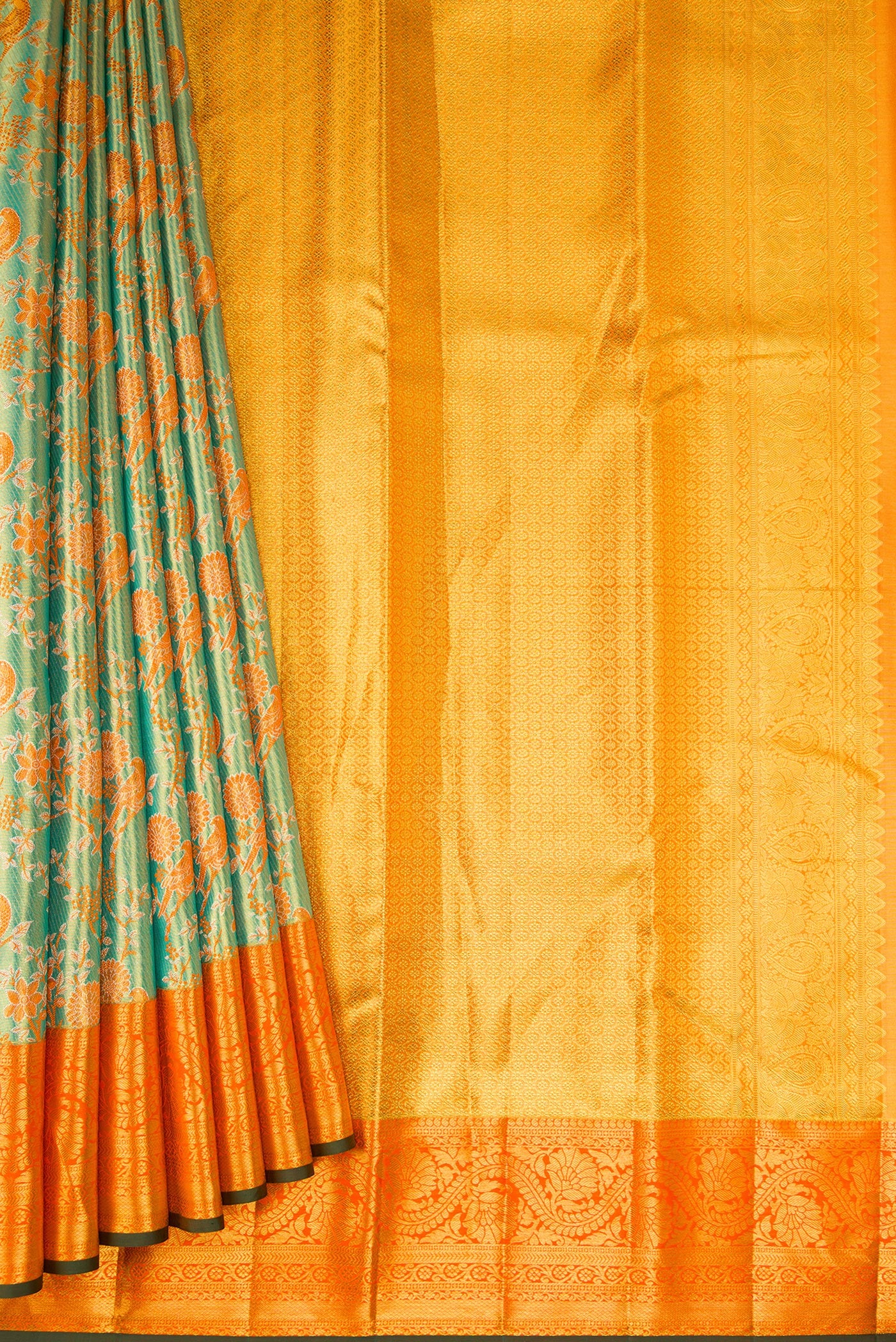 Pleats and pallu of Sea Green Dual Tone Kanjivaram Tissue Silk Saree with Zari Brocade on the body and Zari Border. 