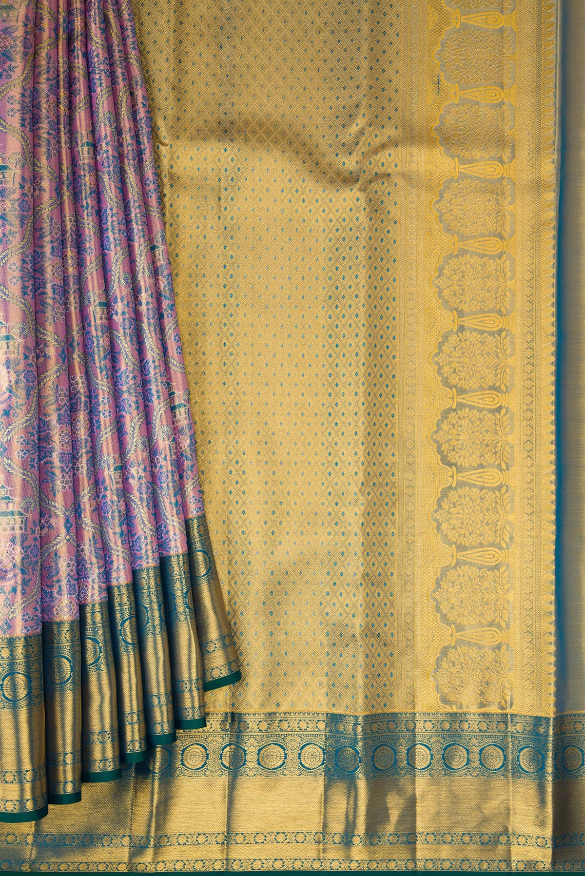 Pleats and pallu of Lavender Dual Tone Kanjivaram Tissue Silk Saree with Zari Brocade on the body and Zari Border. 