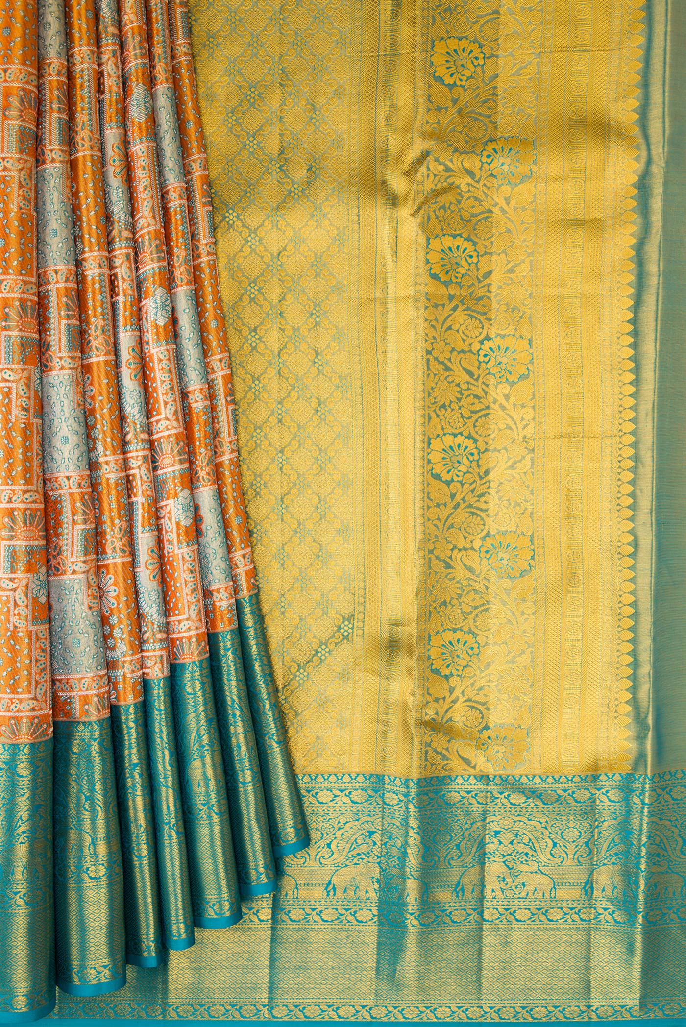Pleats and pallu of Orange Dual Tone Kanjivaram Tissue Silk Saree with Zari Brocade on the body and Zari Border. 