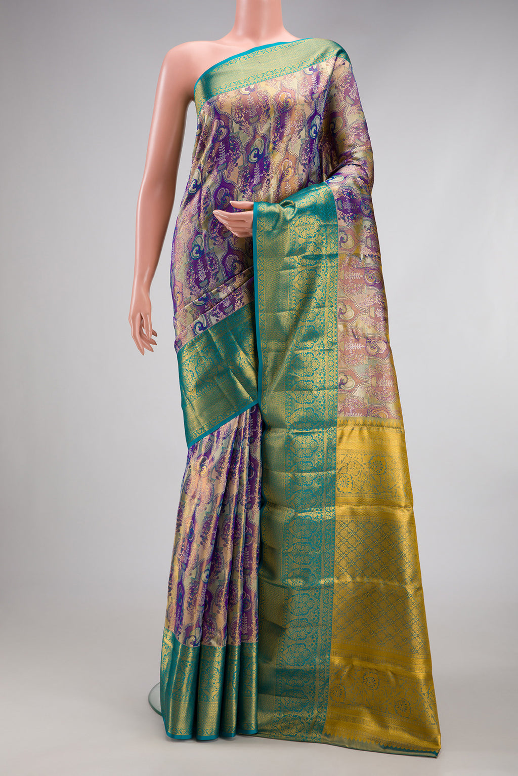 Purple Dual Tone Kanjivaram Tissue Silk Saree with Zari Brocade on the body and Zari Border.  displayed on a mannequin