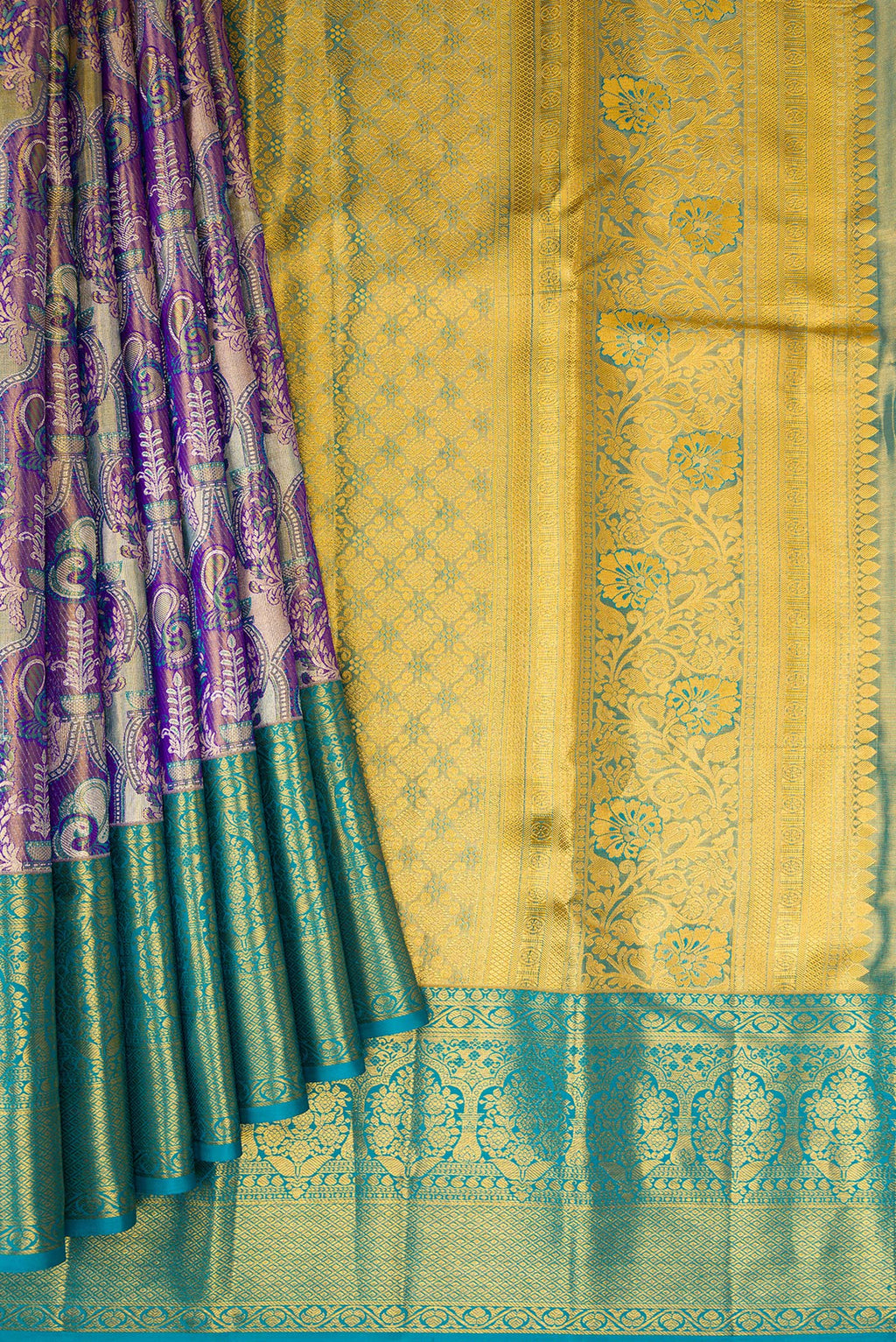Pleats and pallu of Purple Dual Tone Kanjivaram Tissue Silk Saree with Zari Brocade on the body and Zari Border. 
