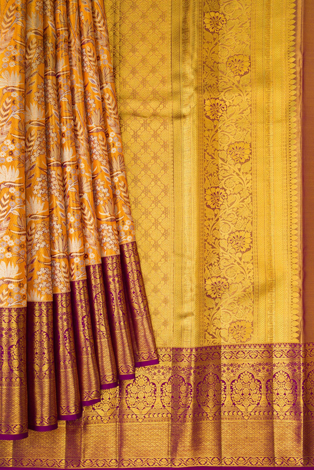 Pleats and pallu of Mustard Dual Tone Kanjivaram Tissue Silk Saree with Zari Brocade on the body and Zari Border. 