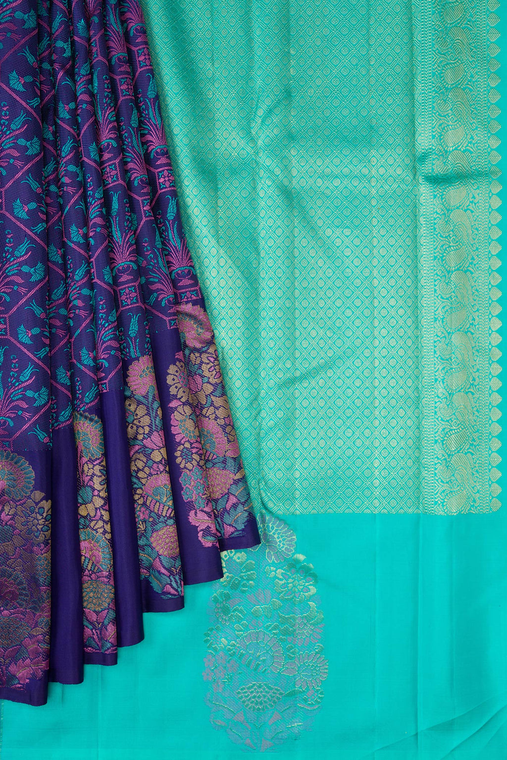 Pleats and pallu of Navy Blue Kanchipuram Silk Saree with Jacquard design on the body and Fancy Border. 
