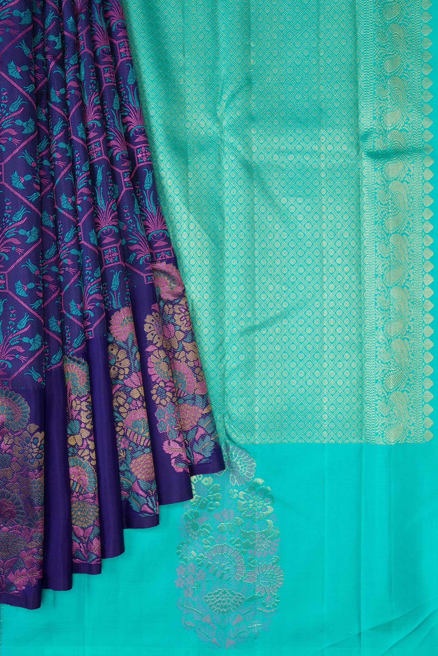 Pleats and pallu of Navy Blue Kanchipuram Silk Saree with Jacquard design on the body and Fancy Border. 