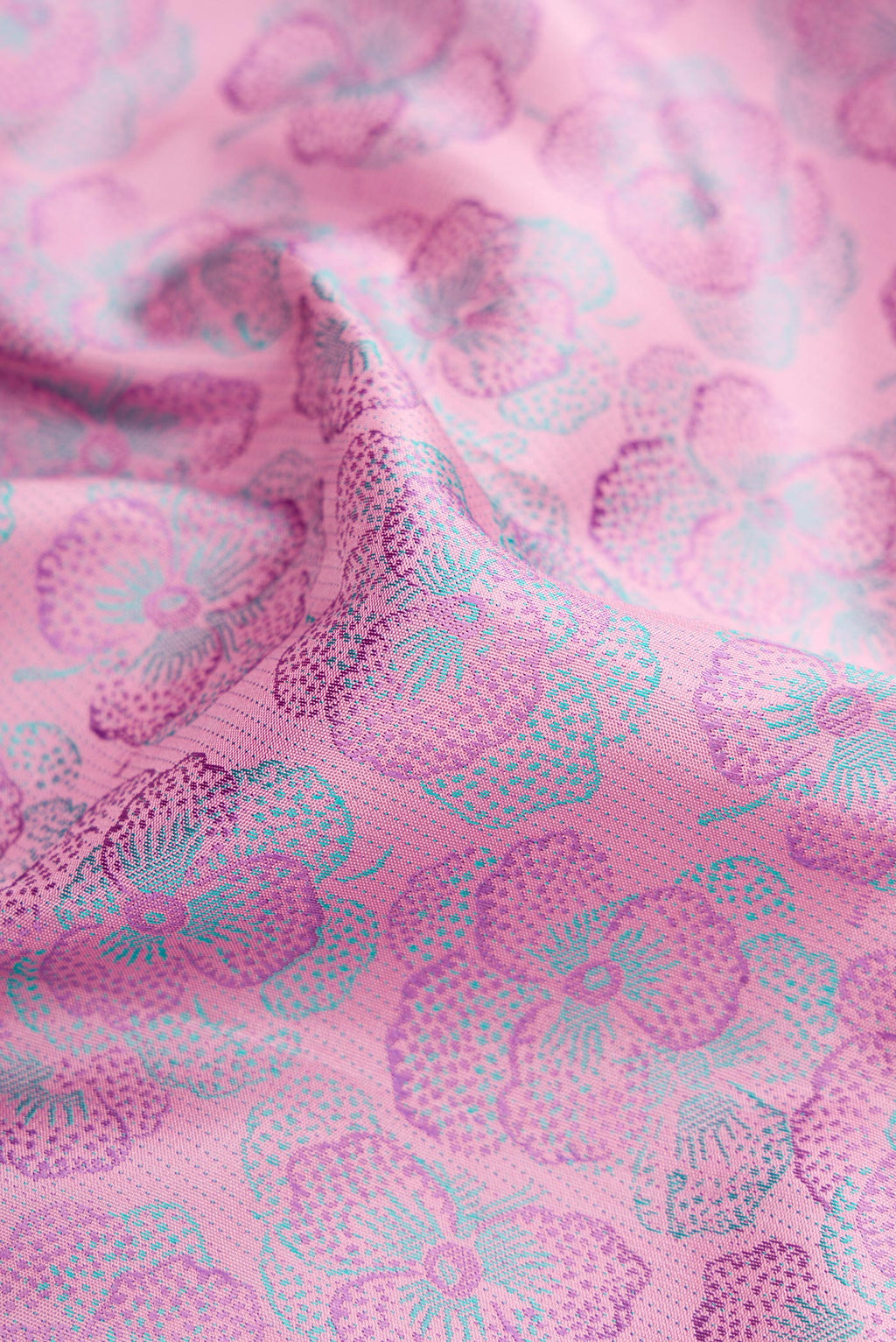 Close up of Pink Dual Tone Kanchipuram Silk Saree with Jacquard design on the body and Fancy Border.  displaying folds