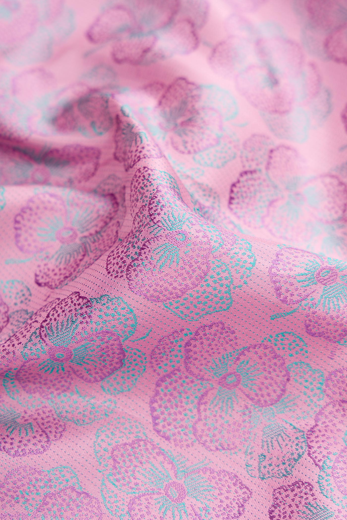 Close up of Pink Dual Tone Kanchipuram Silk Saree with Jacquard design on the body and Fancy Border.  displaying folds