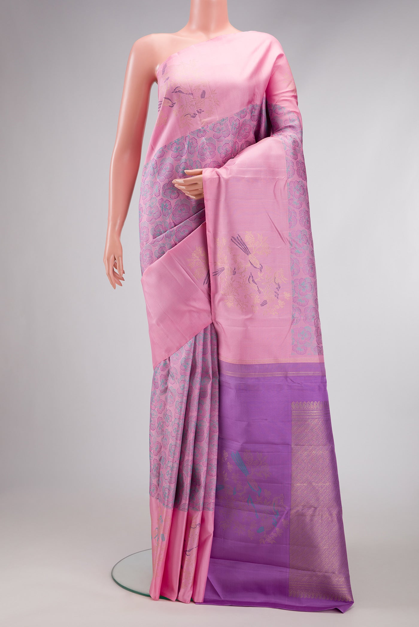 Pink Dual Tone Kanchipuram Silk Saree with Jacquard design on the body and Fancy Border.  displayed on a mannequin