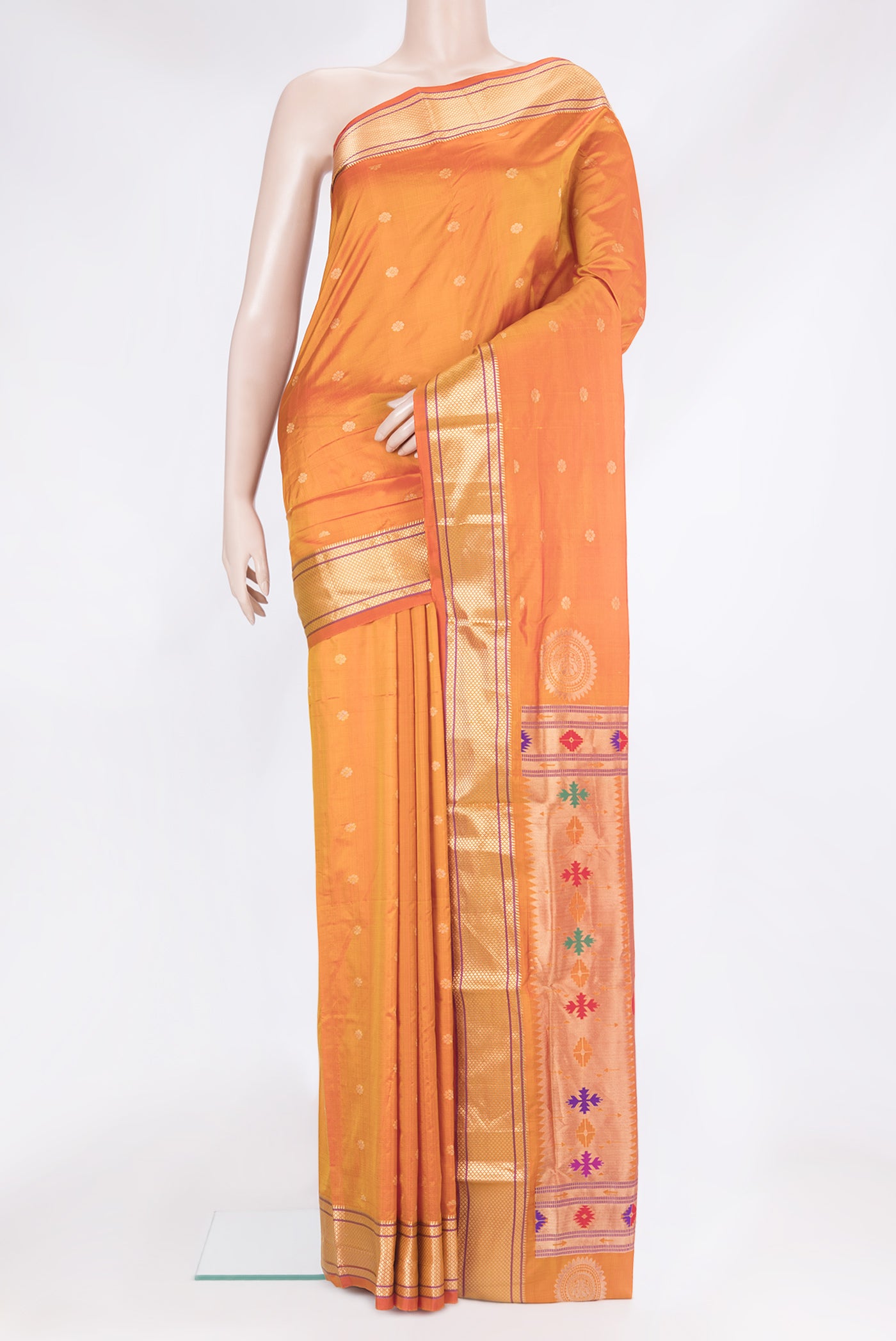 Orange Paithani Silk Saree with Zari Butta on the body and Zari Border.  displayed on a mannequin