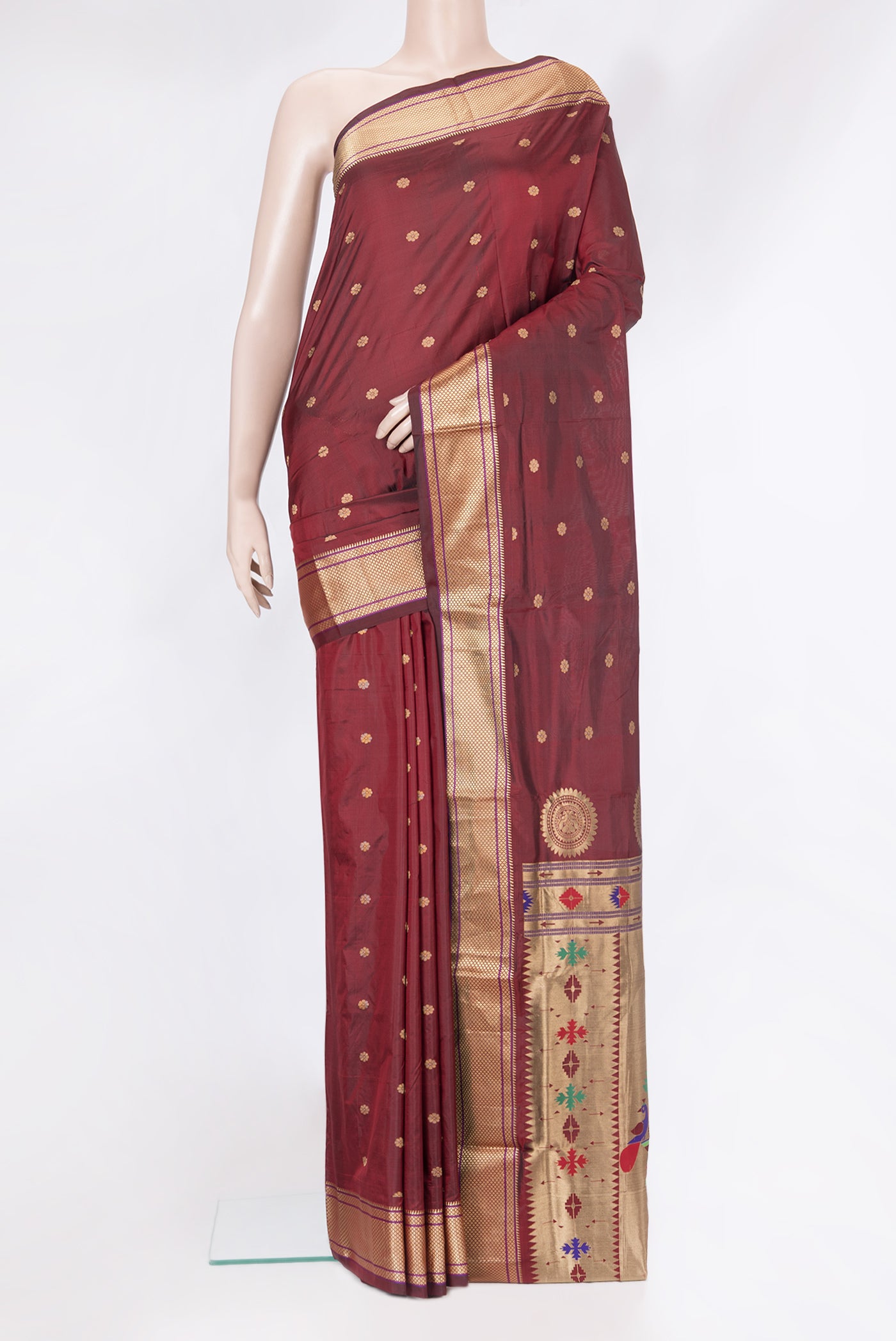 Maroon Blended Paithani Silk Saree with Zari Butta on the body and Zari Border.  displayed on a mannequin