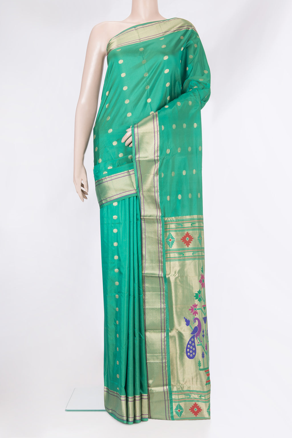 Green Blended Paithani Silk Saree with Zari Butta on the body and Zari Border.  displayed on a mannequin