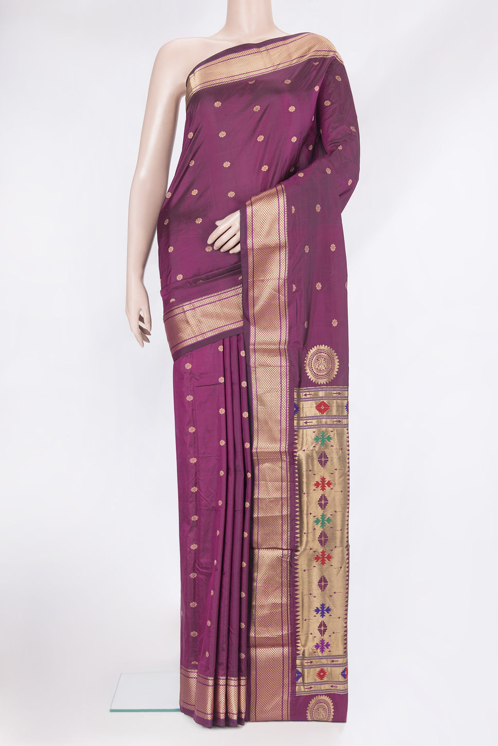 Magenta Paithani Silk Saree with Zari Butta on the body and Zari Border.  displayed on a mannequin