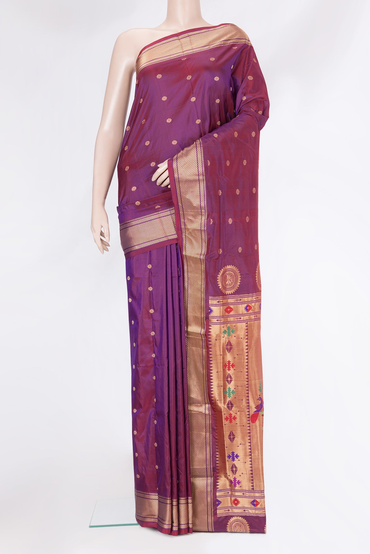 Purple Paithani Silk Saree with Zari Butta on the body and Zari Border.  displayed on a mannequin