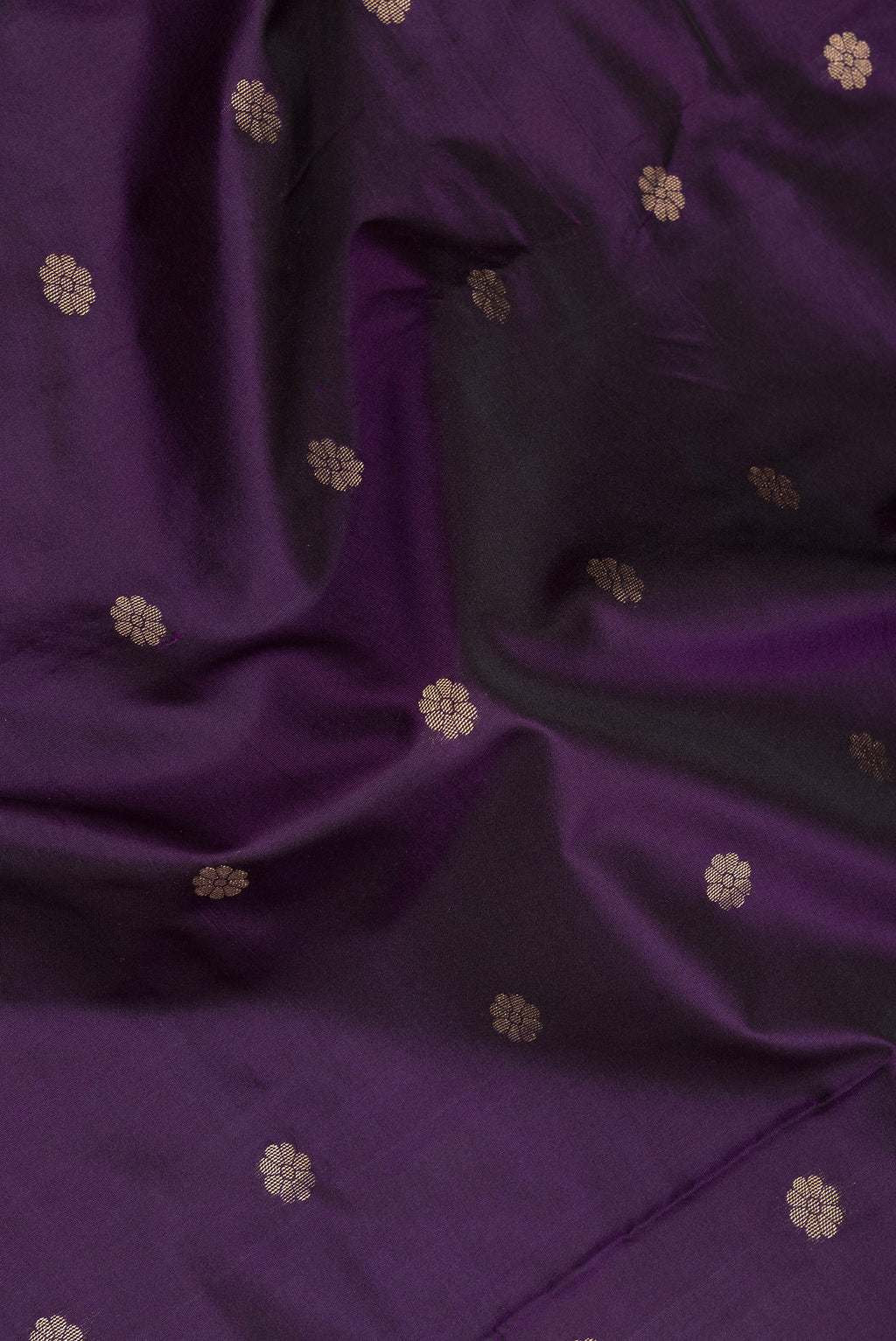 Close up of Violet Blended Paithani Silk Saree with Zari Butta on the body and Zari Border.  displaying folds