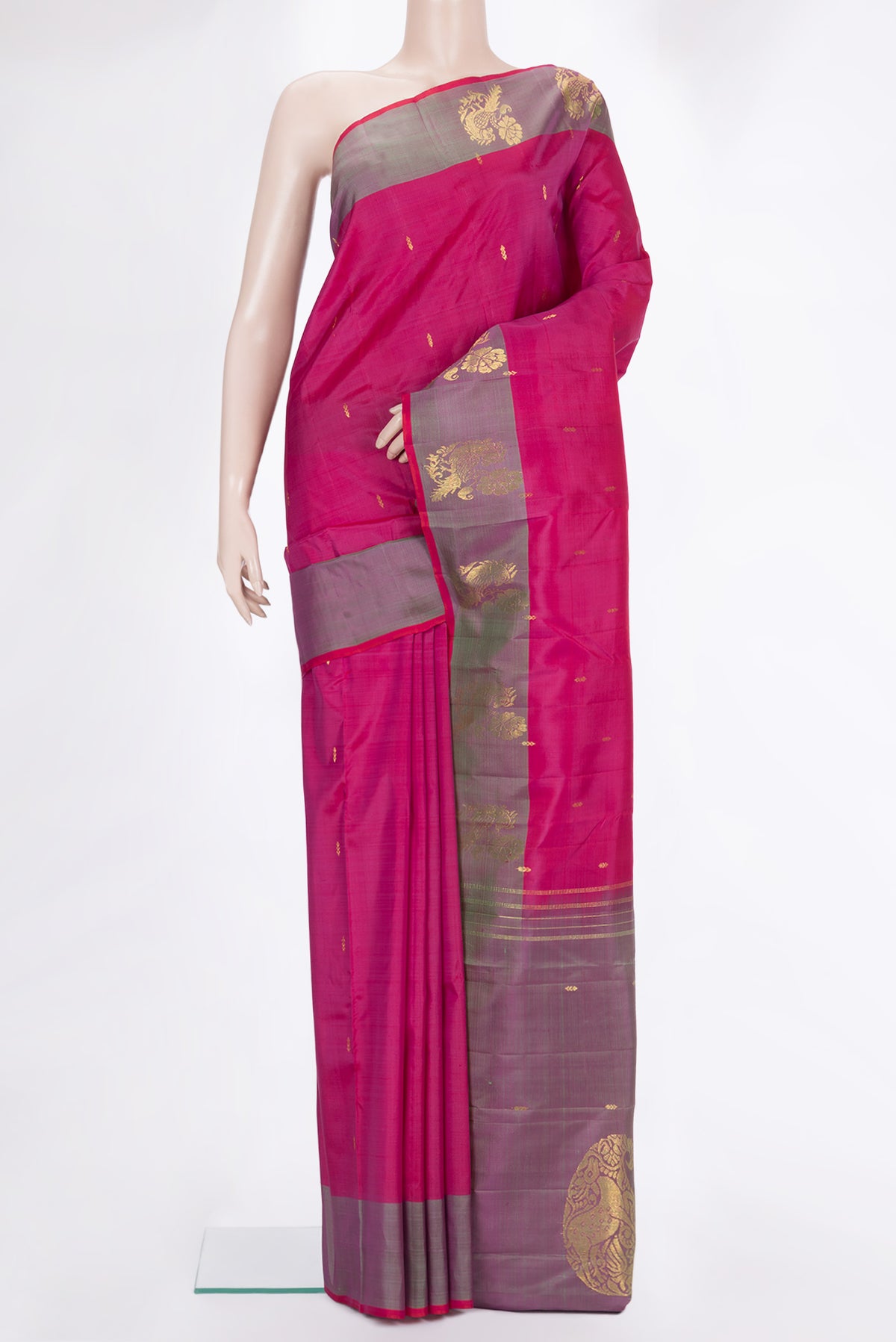 Pure Silk Pink Kanchipuram Saree with Zari Butta on the body and Fancy Border.  displayed on a mannequin