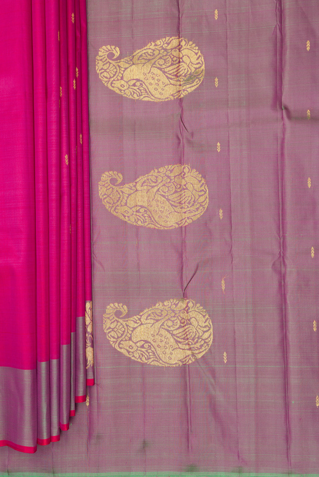 Pleats and pallu of Pure Silk Pink Kanchipuram Saree with Zari Butta on the body and Fancy Border. 
