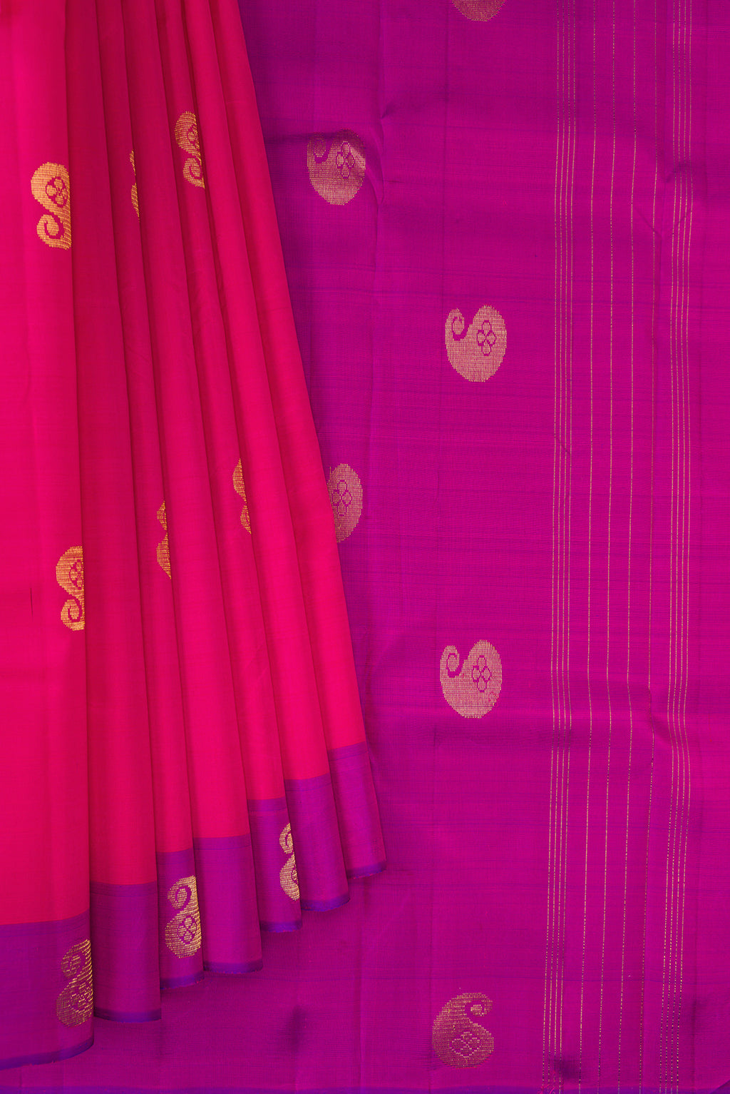 Pleats and pallu of Dark Pink Kanchipuram Silk Saree with Zari Butta on the body and Fancy Border. 