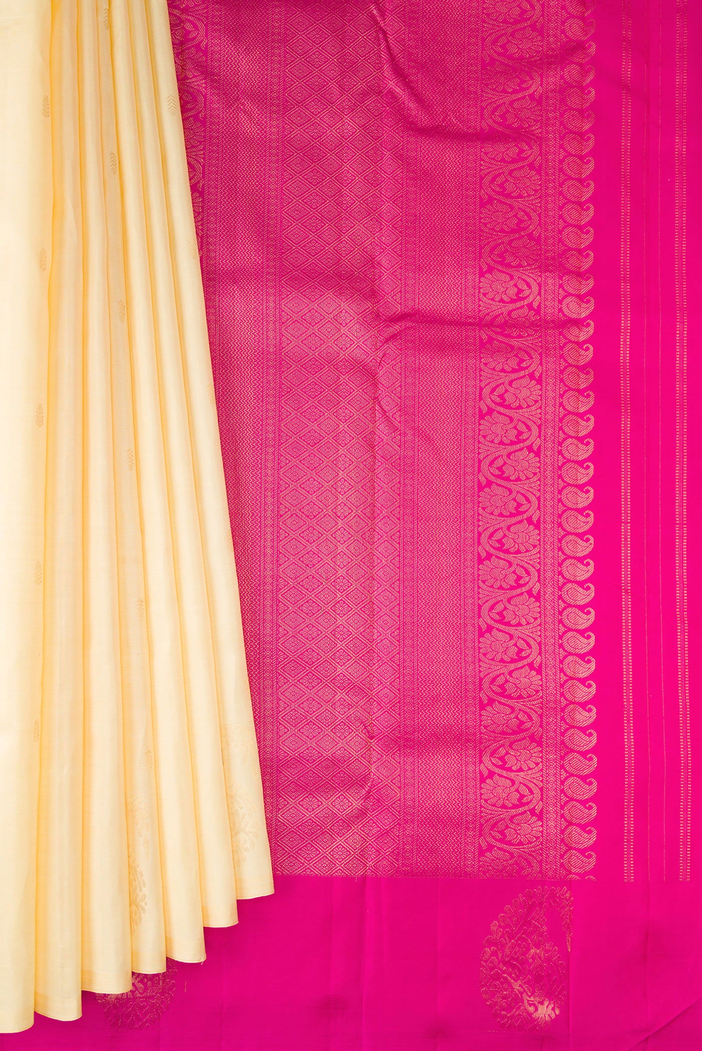 Pleats and pallu of Sandal Kanchipuram Silk Saree with Zari Butta on the body and Without Border. 