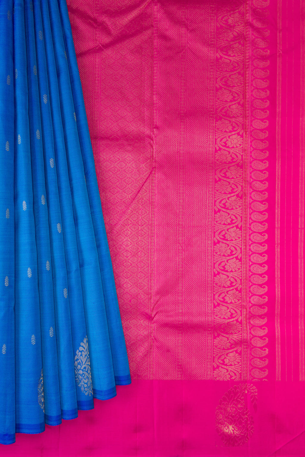 Pleats and pallu of Blue Kanchipuram Silk Saree with Zari Butta on the body and Without Border. 