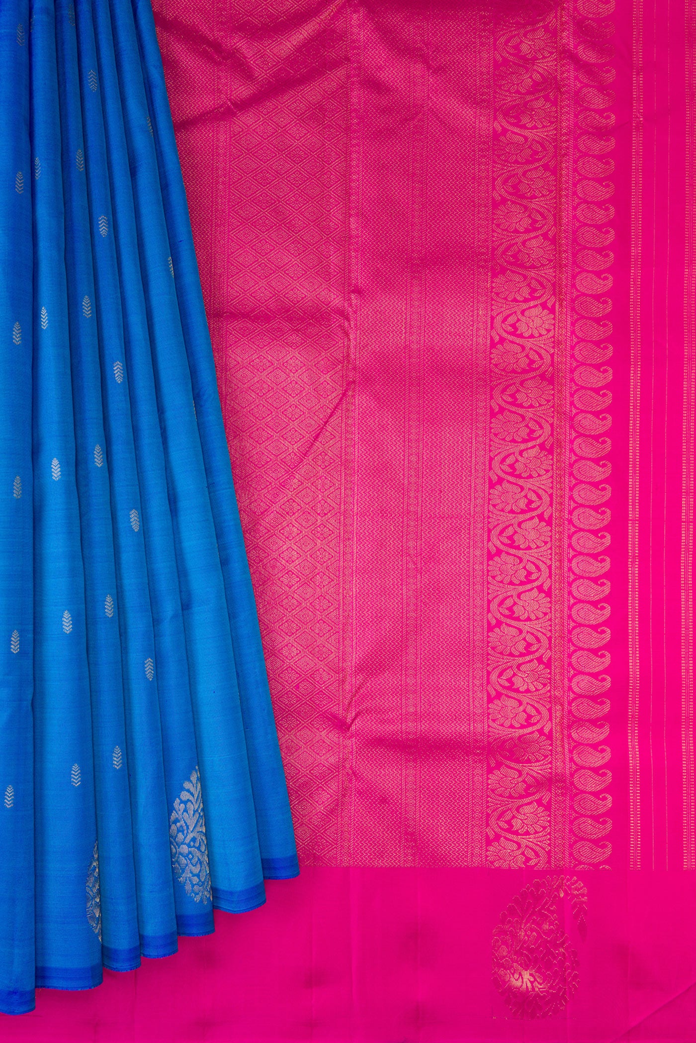 Pleats and pallu of Blue Kanchipuram Silk Saree with Zari Butta on the body and Without Border. 