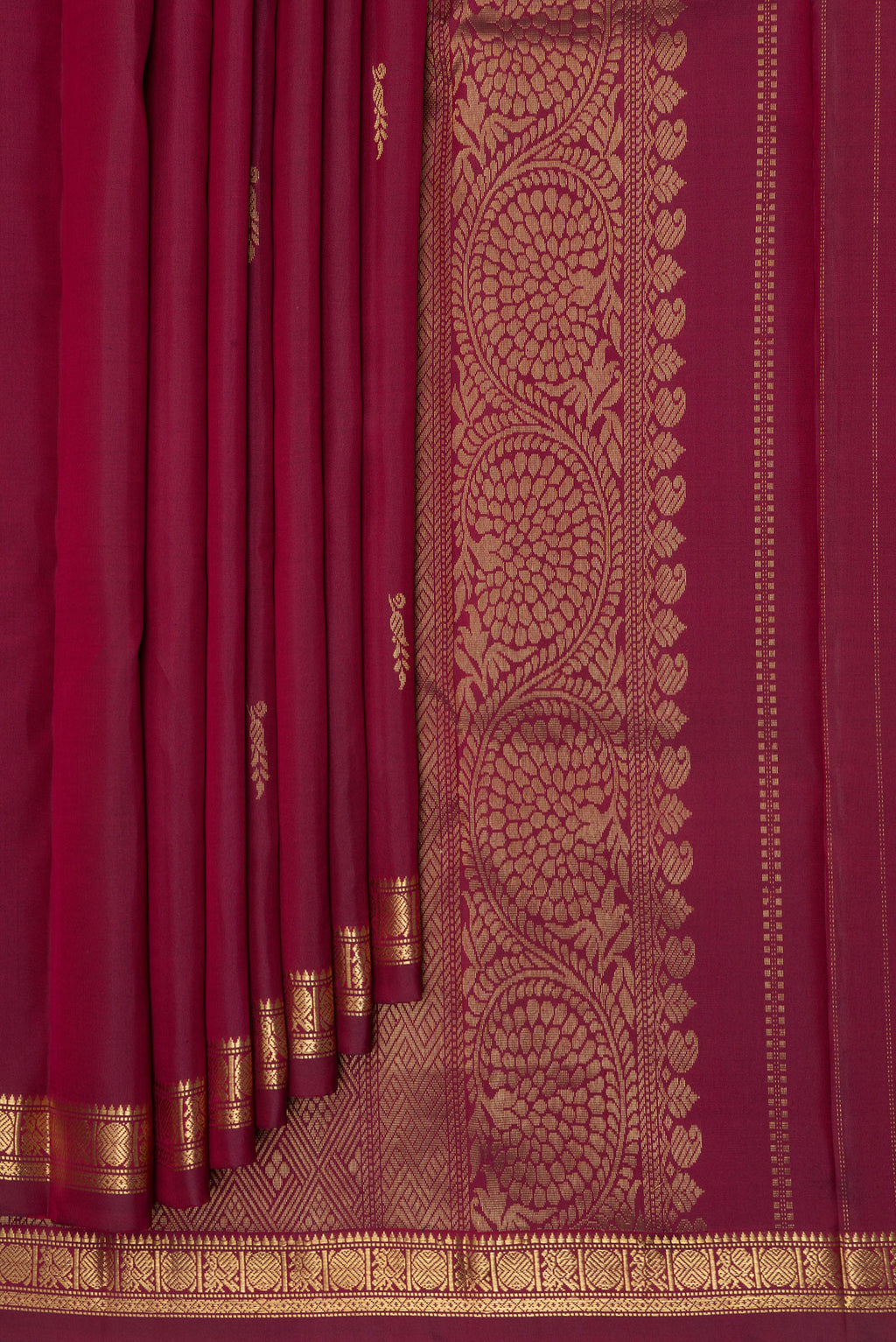 Pleats and pallu of Maroon Dual Tone Blended Kanjivaram Silk Saree with Zari Butta on the body and Zari Border. 