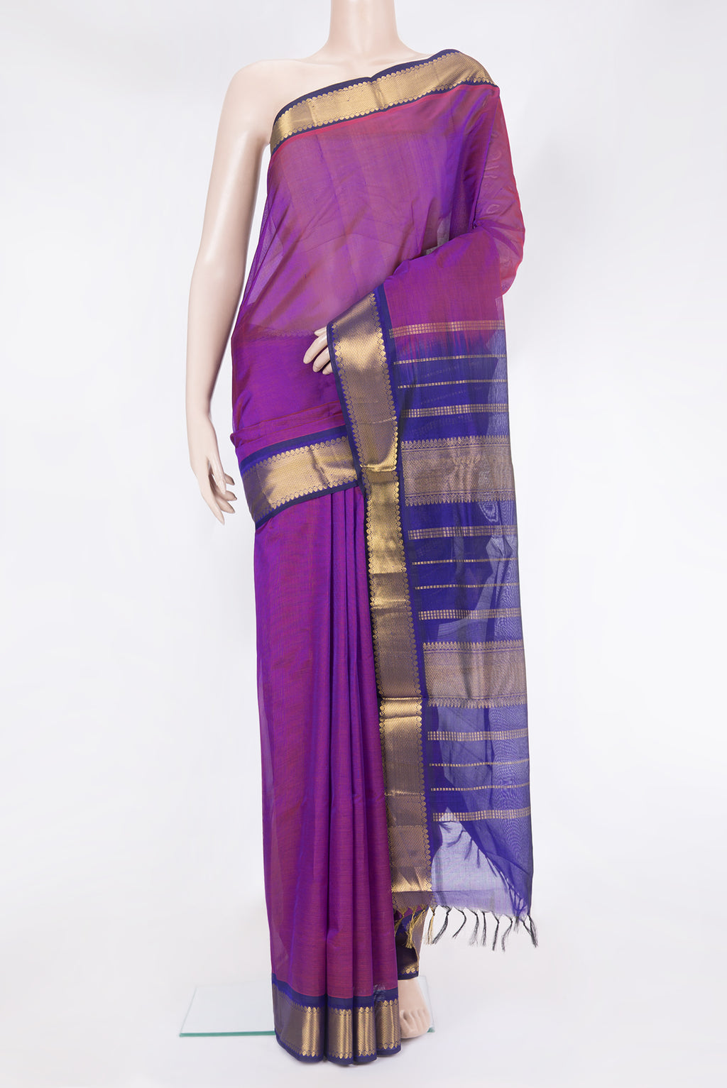 Purple Silk Cotton Saree with Plain Body and Zari Border.  displayed on a mannequin