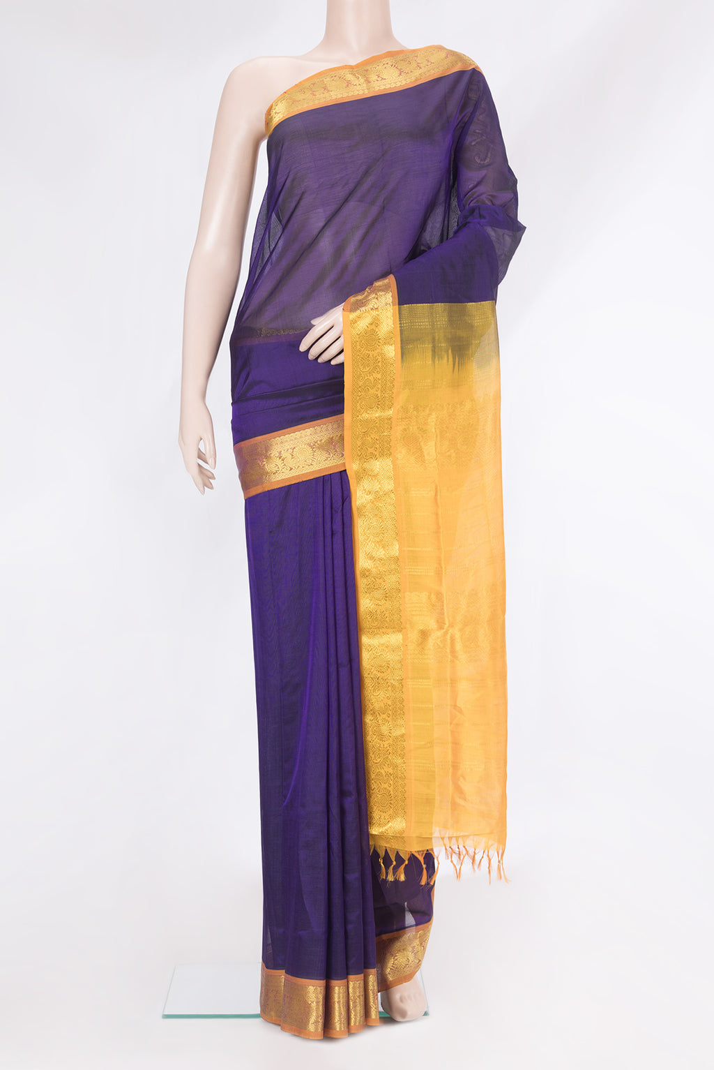 Violet Silk Cotton Saree with Plain Body and Zari Border.  displayed on a mannequin