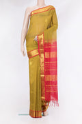 Mehandi Green Silk Cotton Saree with Zari Butta on the body and Zari Border.  displayed on a mannequin