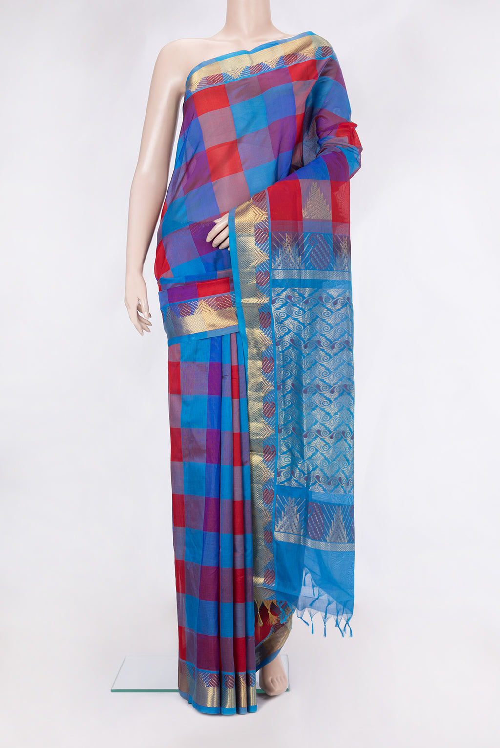 Multi Color Silk Cotton Saree with Checked design on the body and Zari And Thread Border.  displayed on a mannequin
