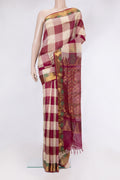 Multi Color Silk Cotton Saree with Checked design on the body and Zari And Thread Border.  displayed on a mannequin